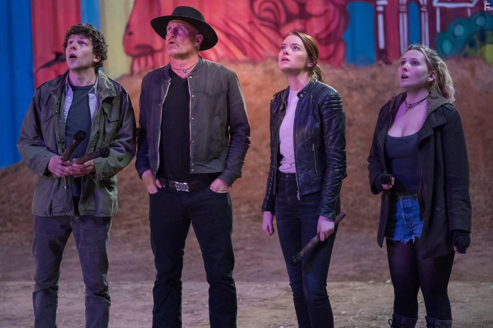 Woody Harrelson, Jesse Eisenberg, Abigail Breslin, and Emma Stone in Zombieland: Double Tap (2019)