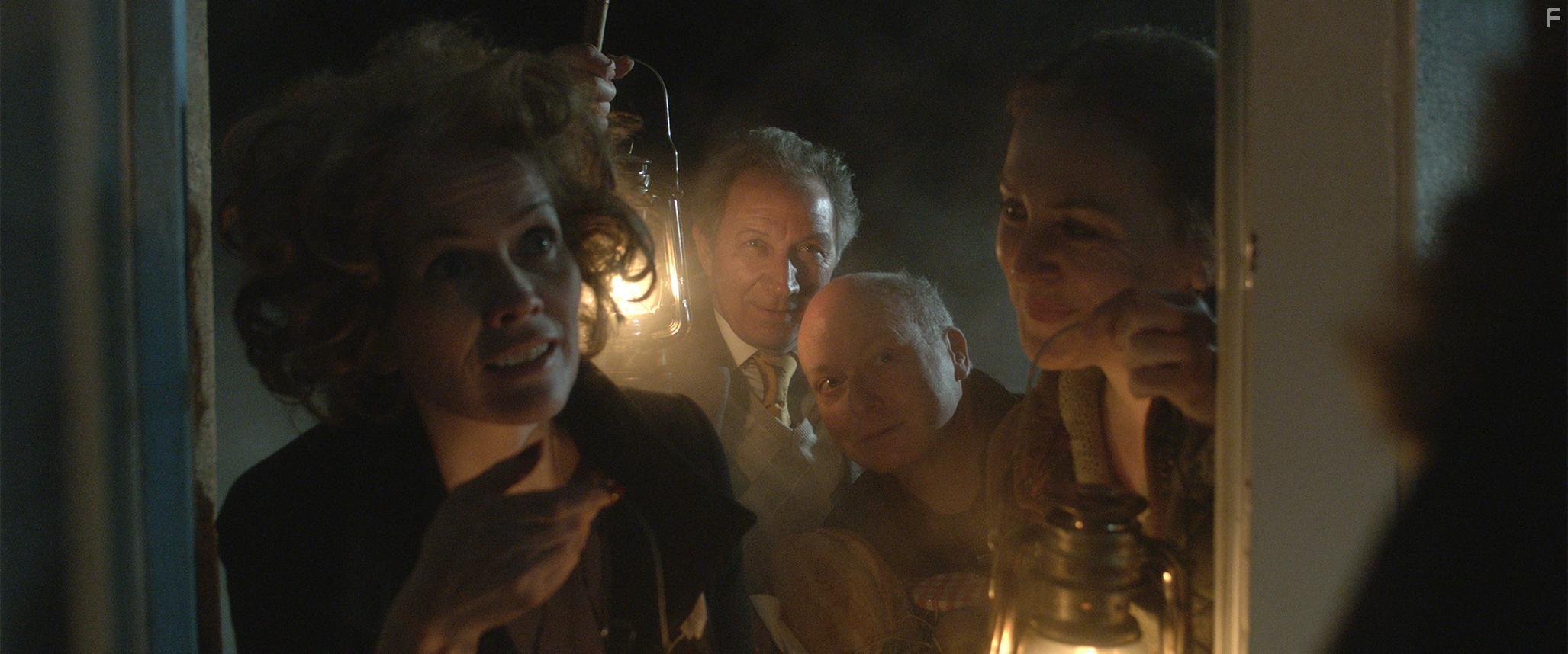 Therese Bradley, Richard Hope, Rebecca Johnson, and Timothy Harker in The Village in the Woods (2019)