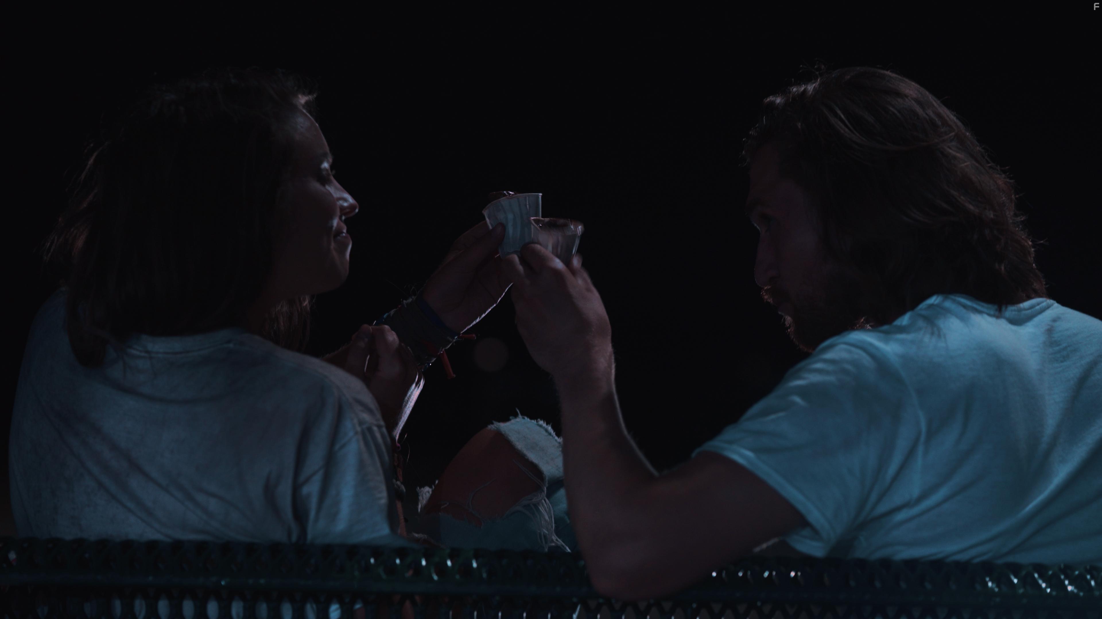 Derek Long and Alice Van Heuven in Not Alone (2019)