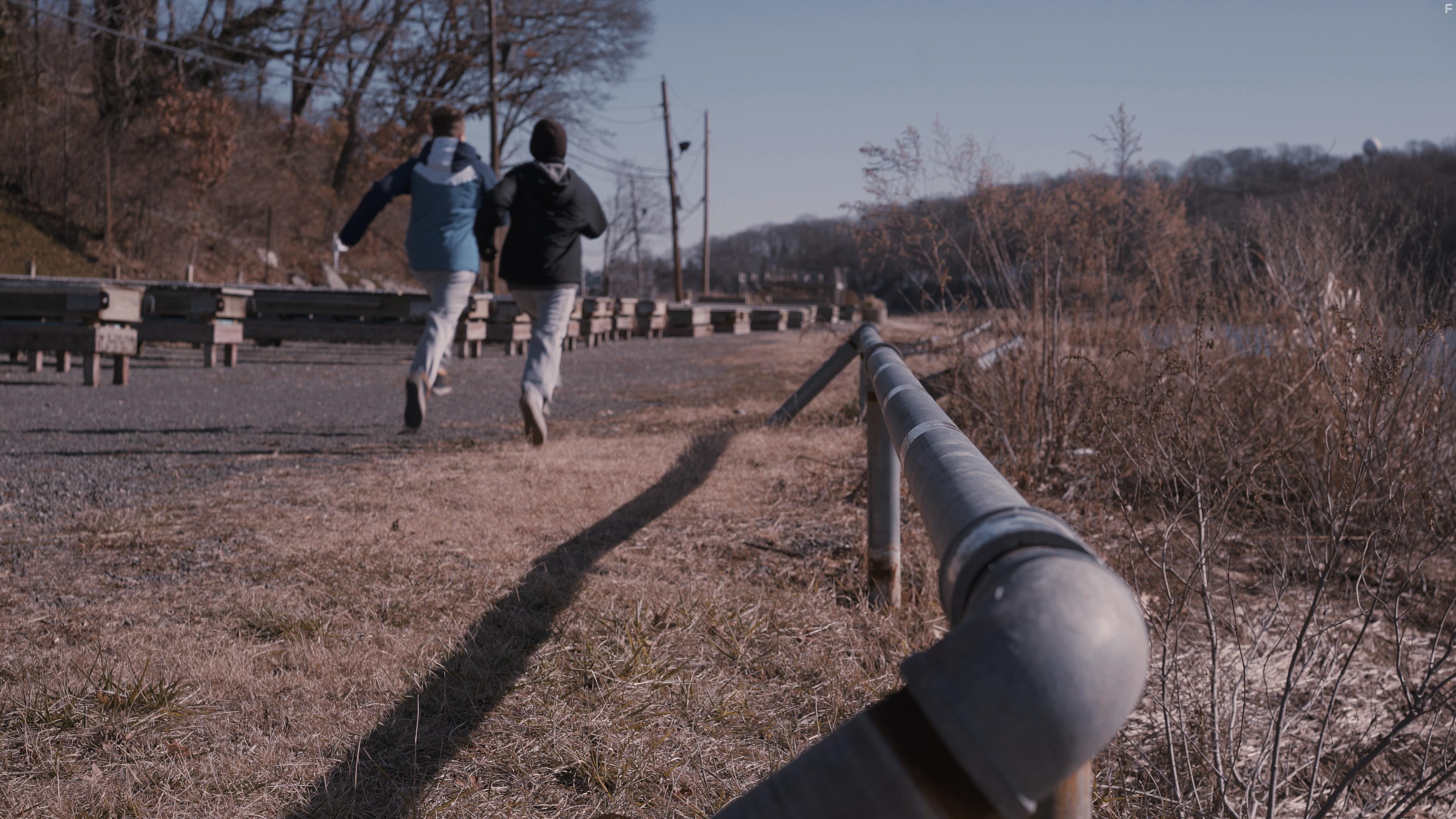 Derek Long and John Madsen in Not Alone (2019)