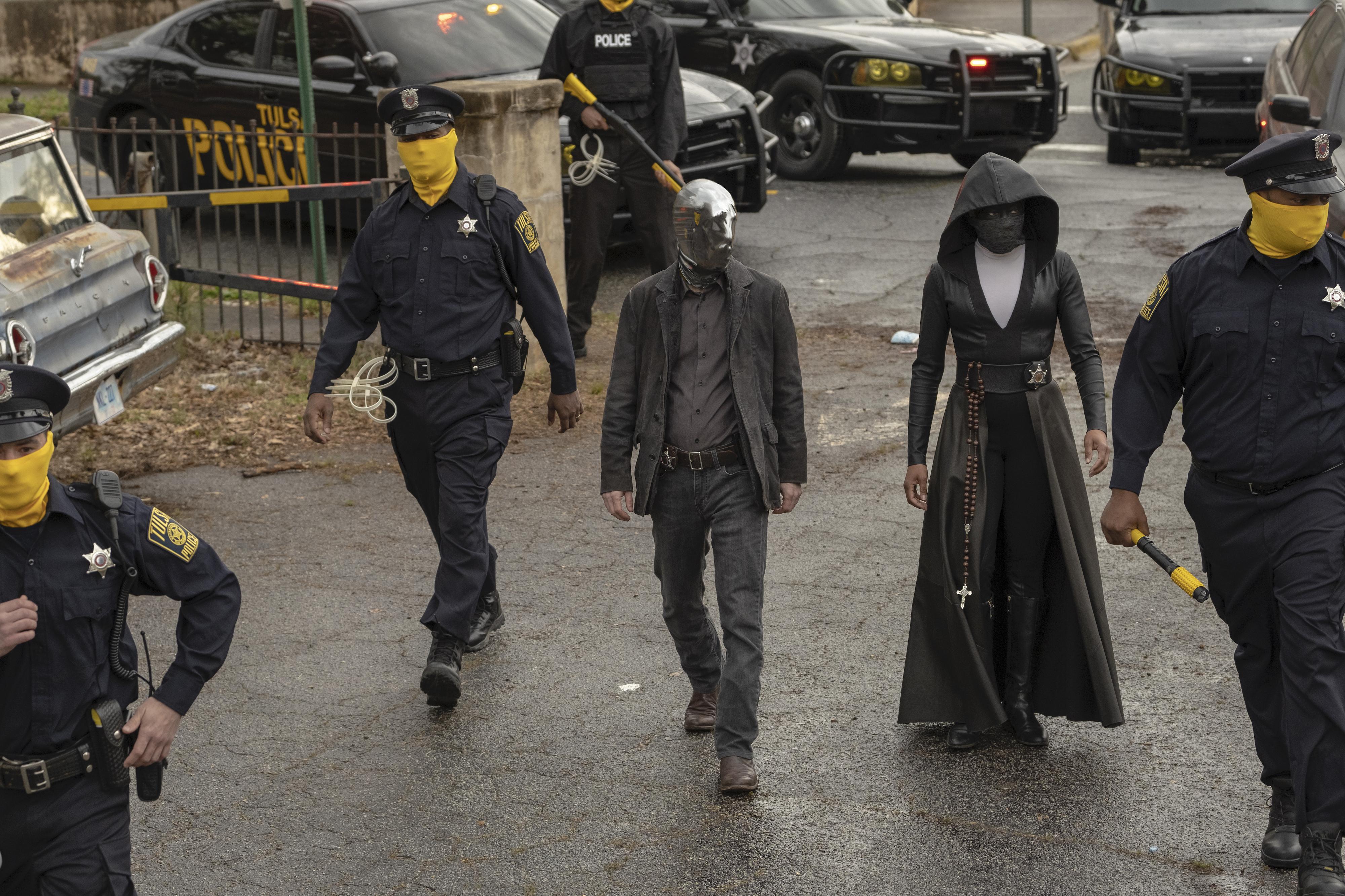 Regina King and Tim Blake Nelson in Watchmen (2019)