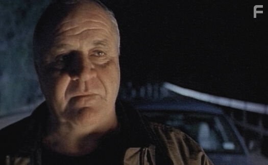 Steve Eastin as Detective Russell