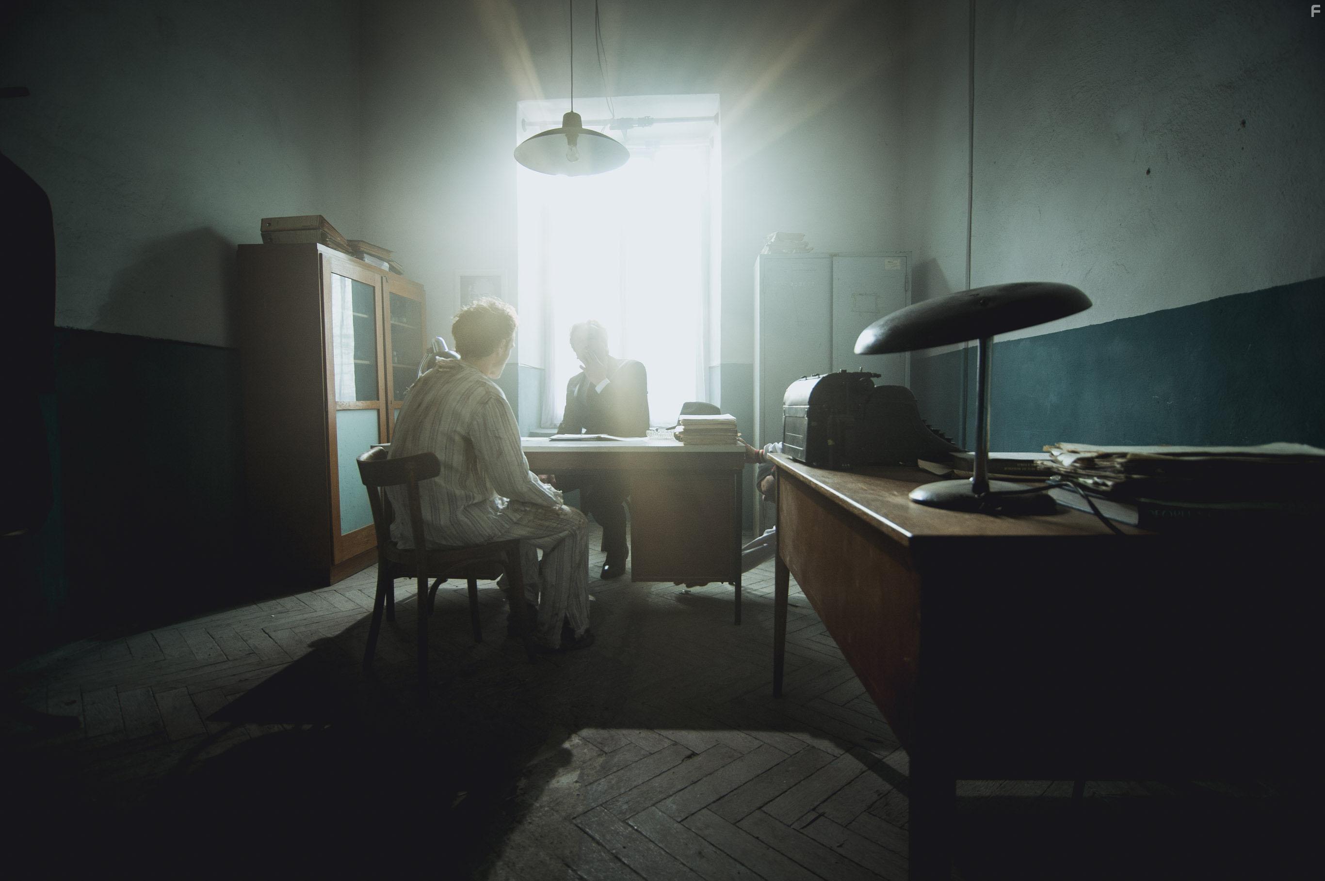 Scene from Tortured for Christ. Alexandru Fainisi as Matchevici and Dimitrii Bogomaz as the Political Officer.