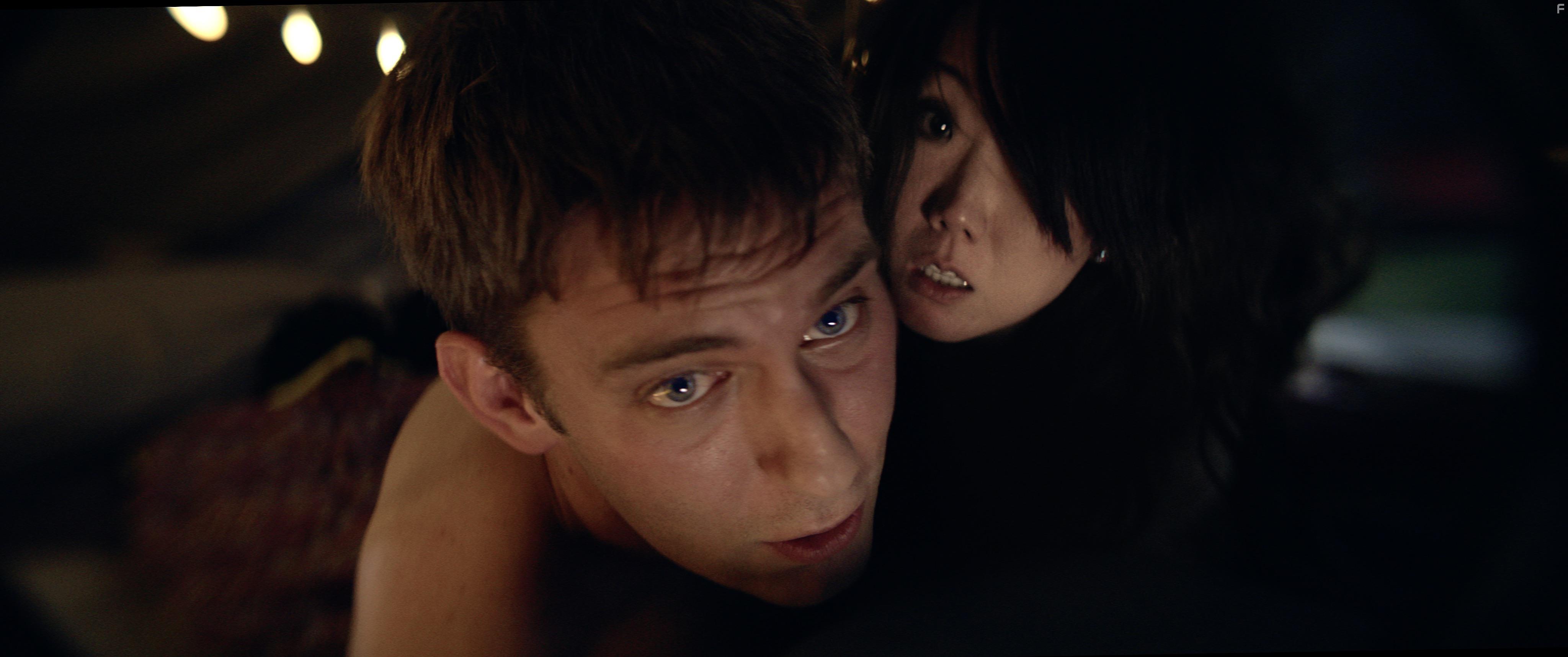 Christina July Kim and William Romano-Pugh in Stay Out Stay Alive (2019)