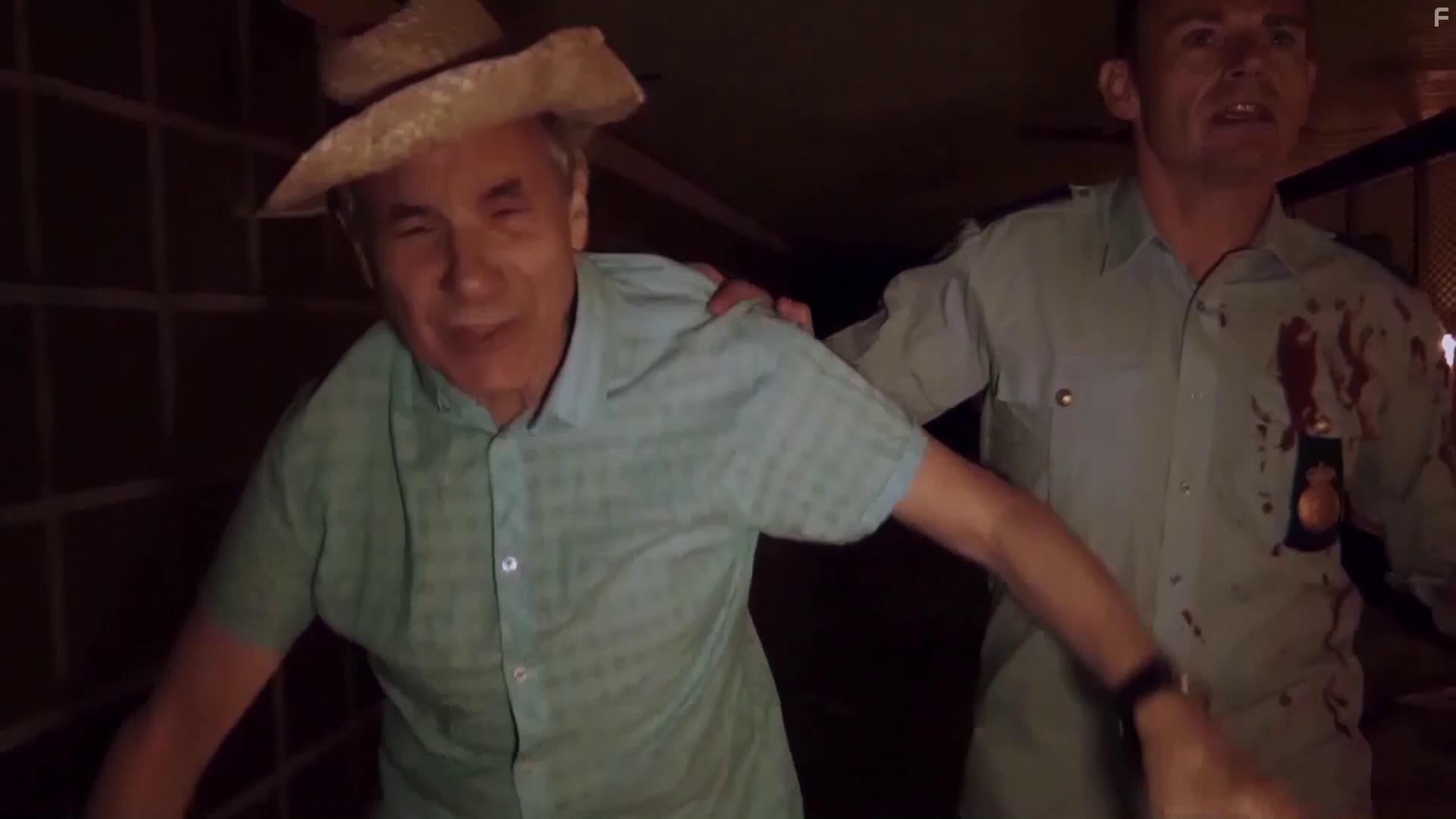 Lloyd Kaufman and Kim Snderholm in Escaping the Dead (2017)