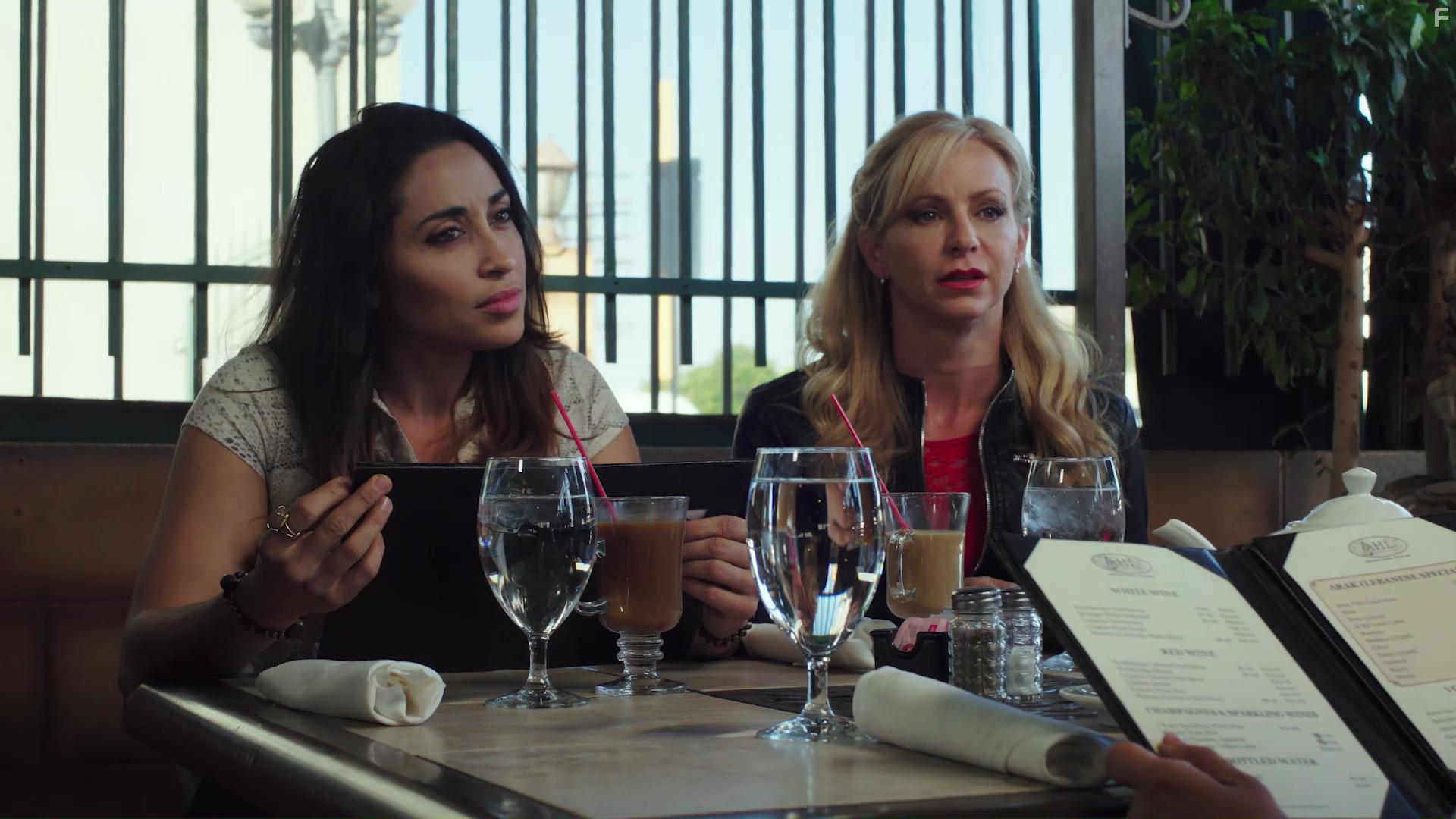 Olivia Dunkley and Michelle Jubilee Gonzalez in A Holiday Boyfriend (2019)