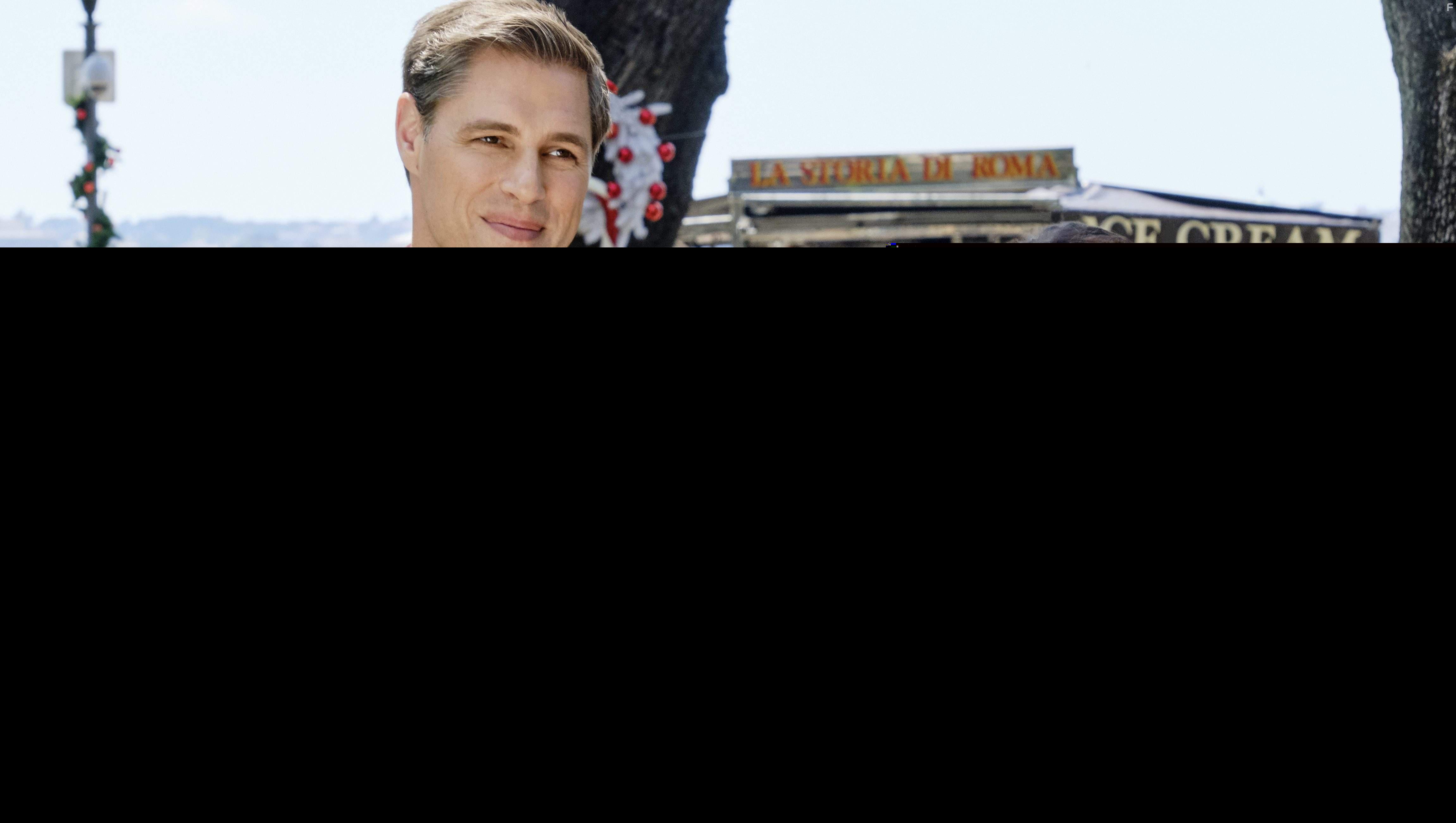 Lacey Chabert and Sam Page in Christmas in Rome (2019)