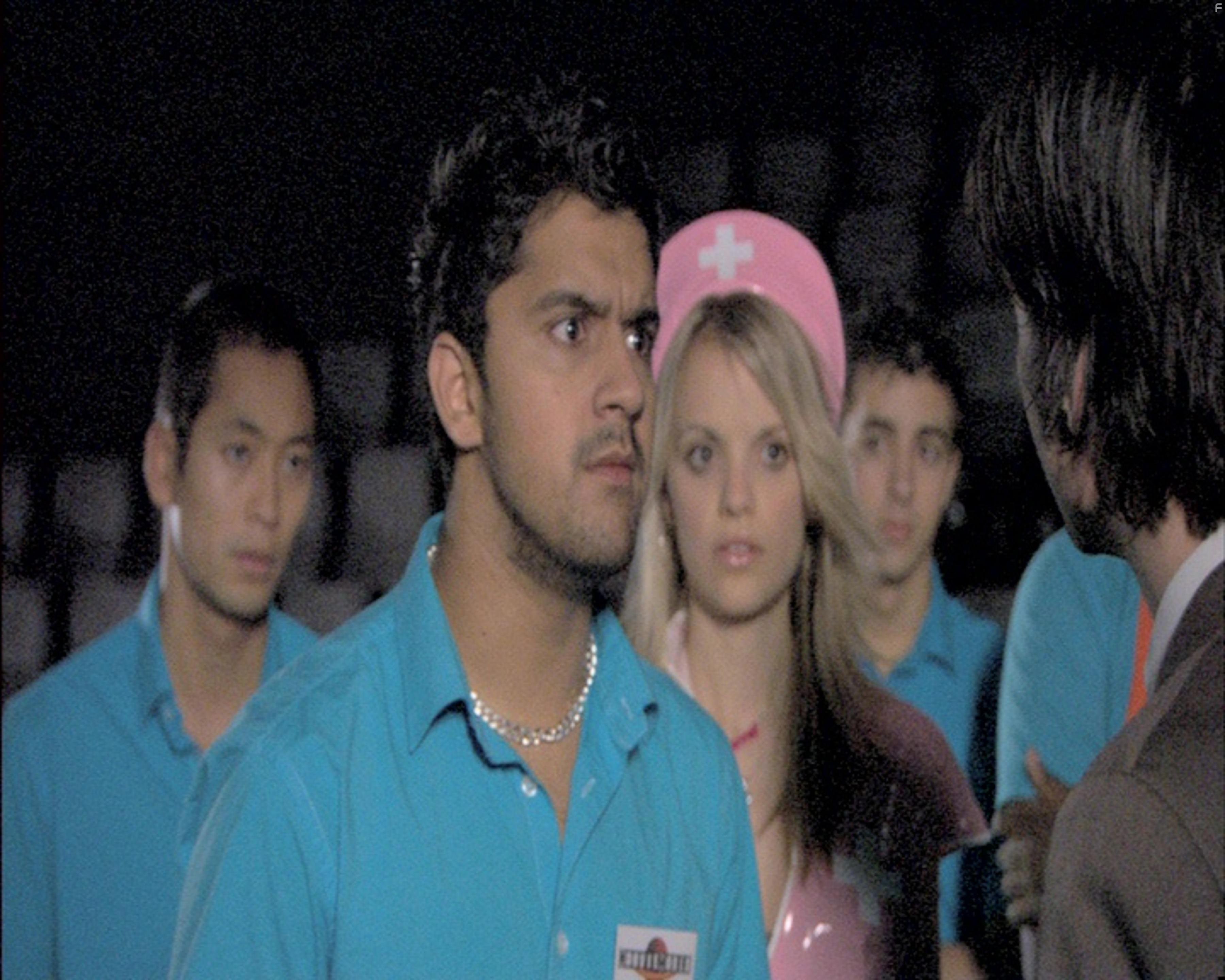 Laura Aikman and Chike Chan in Попкорн (2007)