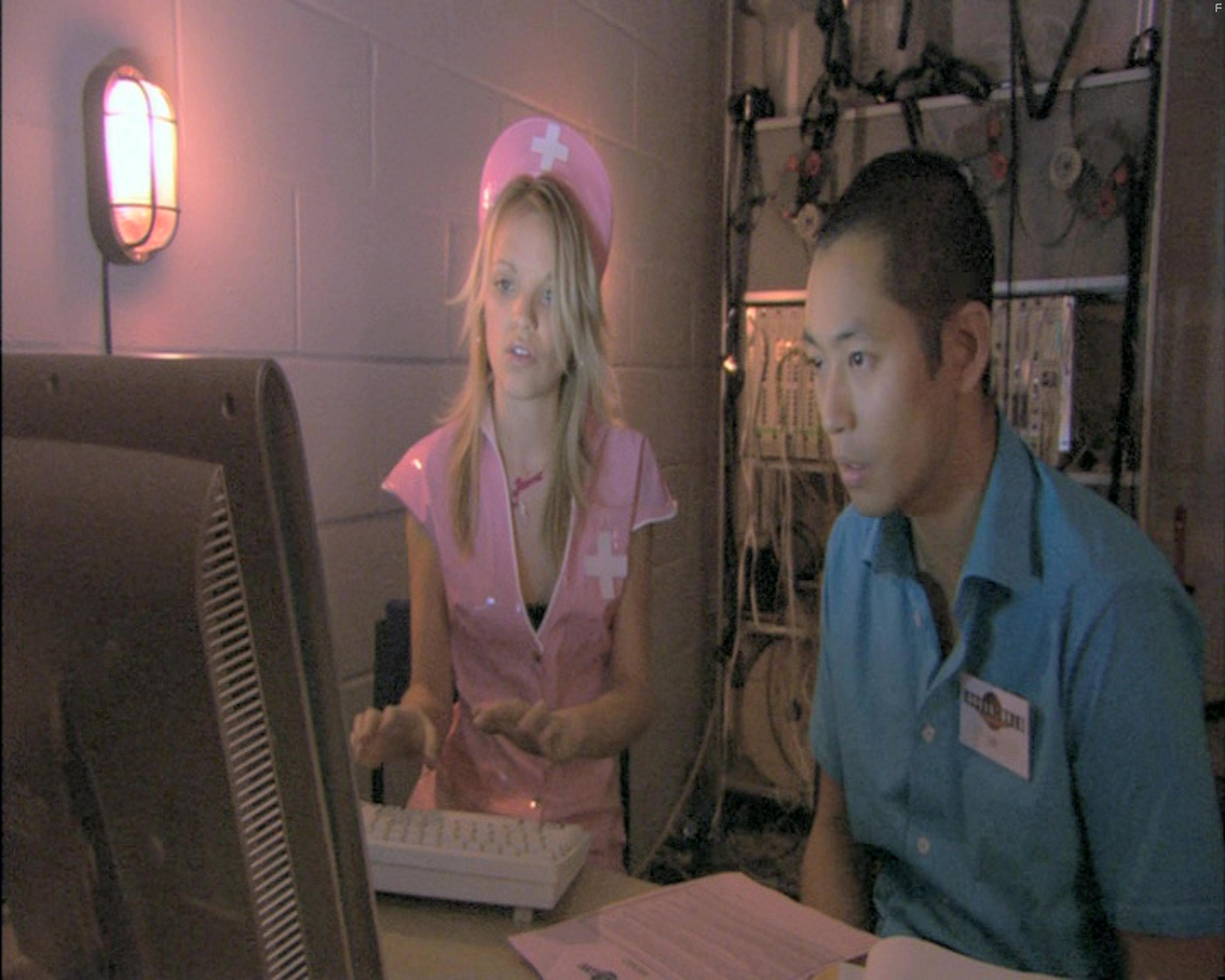 Laura Aikman and Chike Chan in Попкорн (2007)