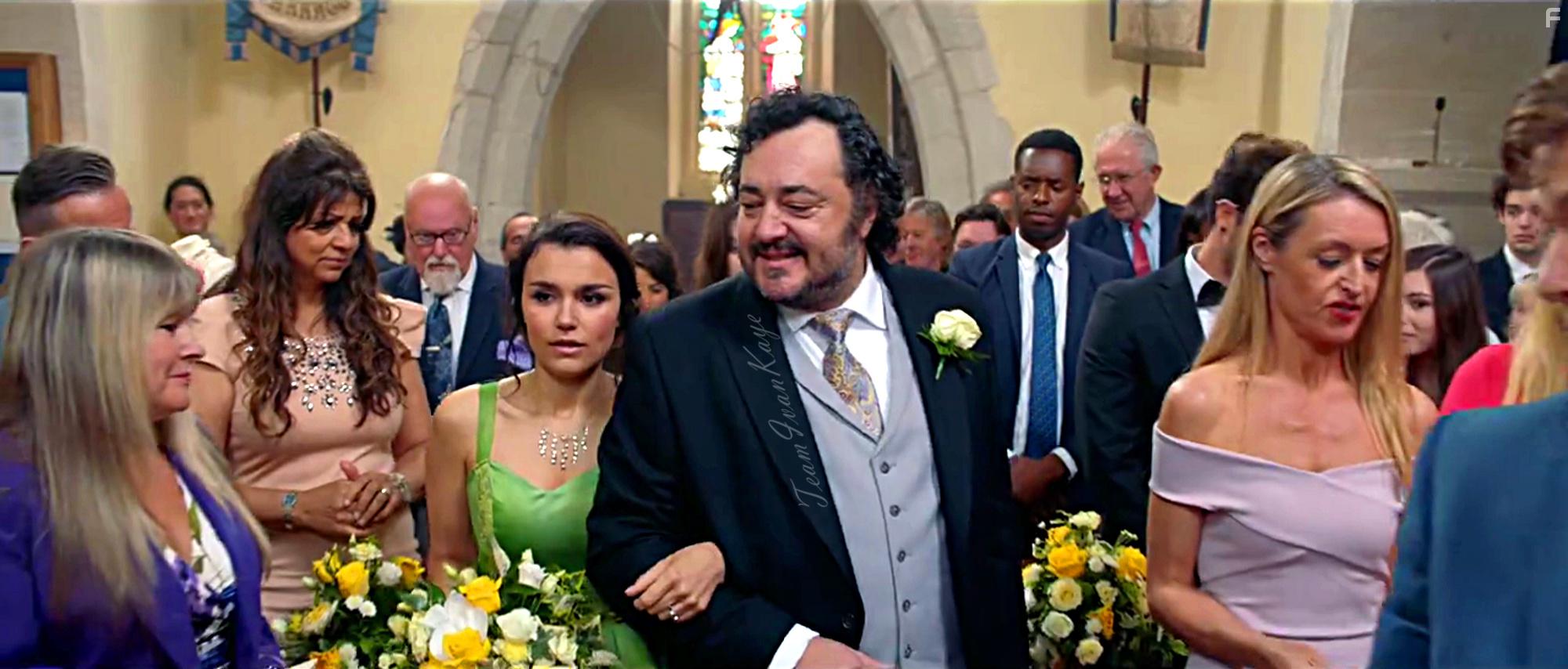 Ivan Kaye and Samantha Barks in The Revenger: An Unromantic Comedy (2019)