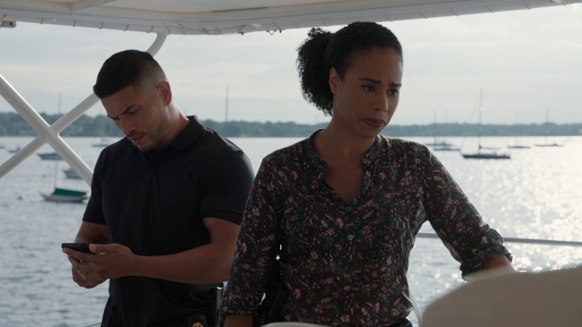 Miguel Gomez and Roxy Sternberg in FBI: Most Wanted: Exposed (2021)