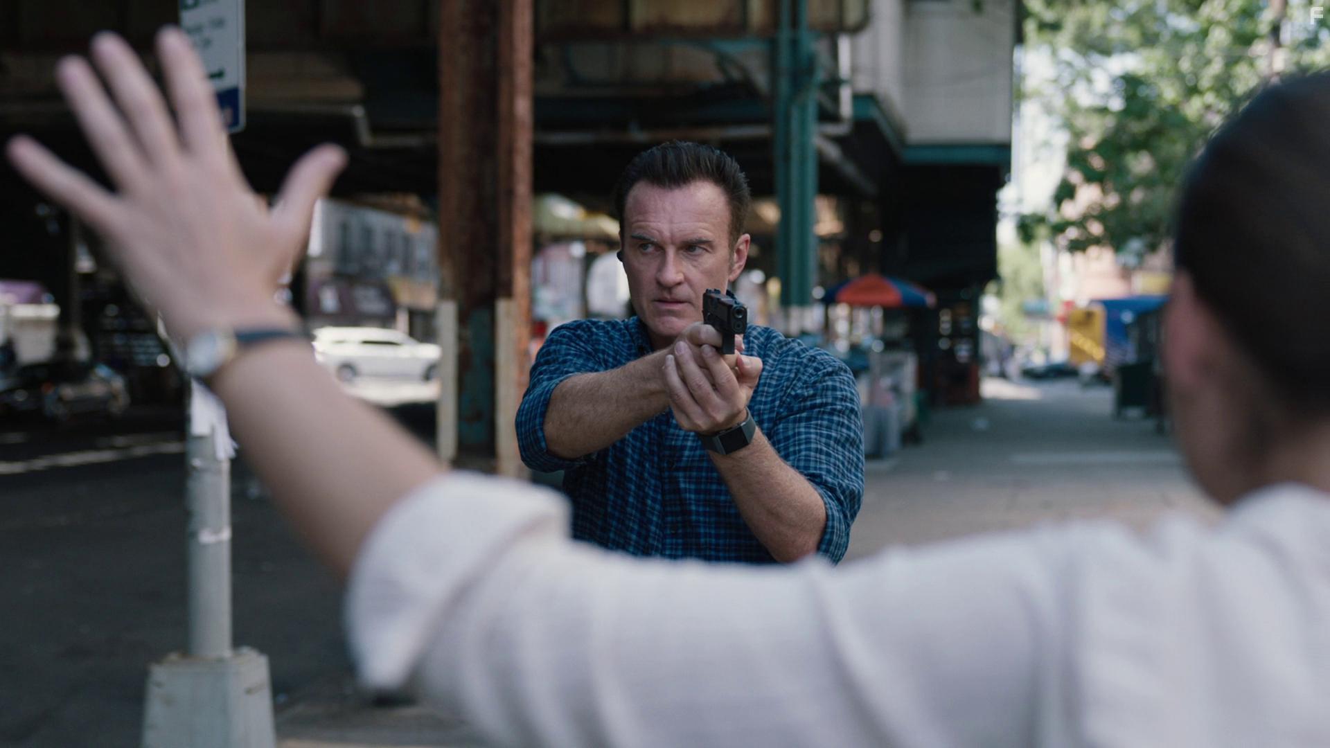 Julian McMahon and Alexa Davalos in FBI: Most Wanted: Exposed (2021)