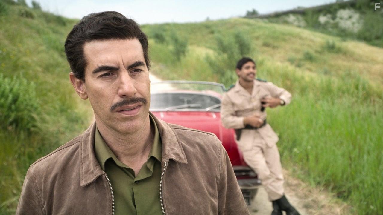 Sacha Baron Cohen and Nassim Lyes in The Spy (2019)