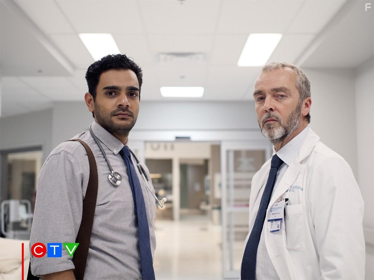 John Hannah and Hamza Haq in Transplant (2020)