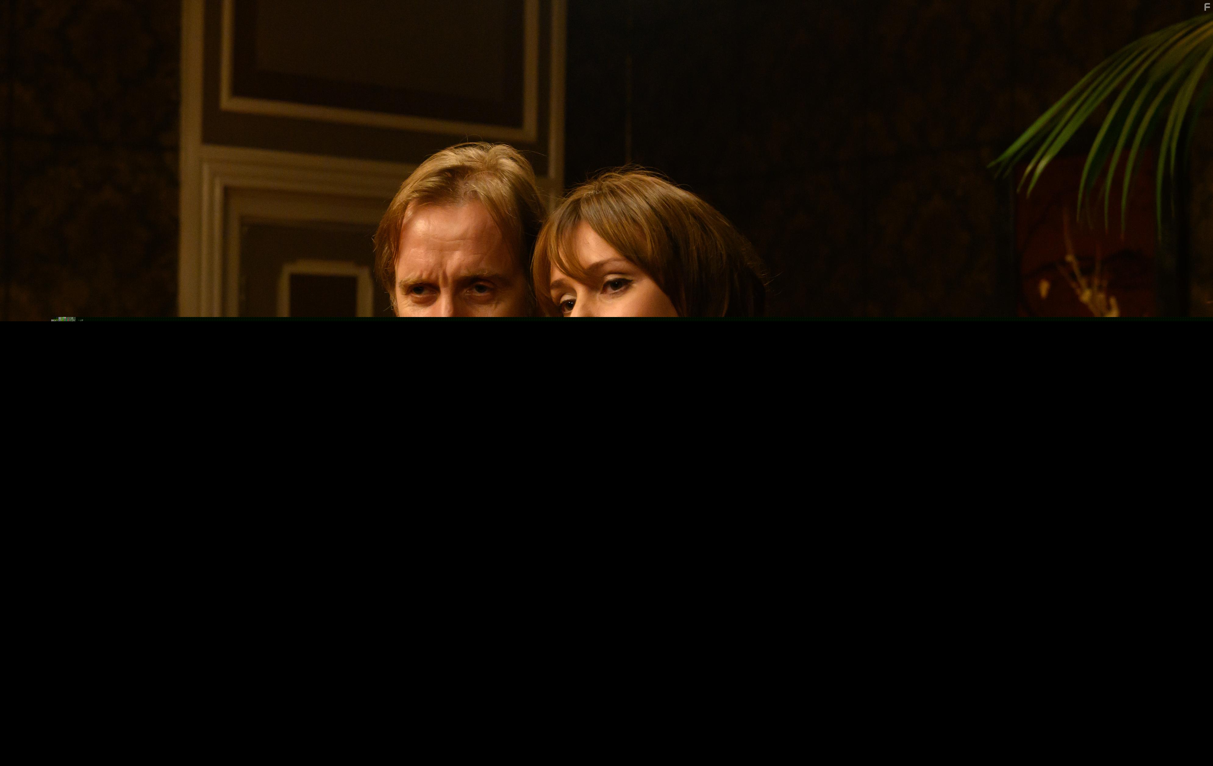 Keeley Hawes and Rhys Ifans in Misbehaviour (2020)