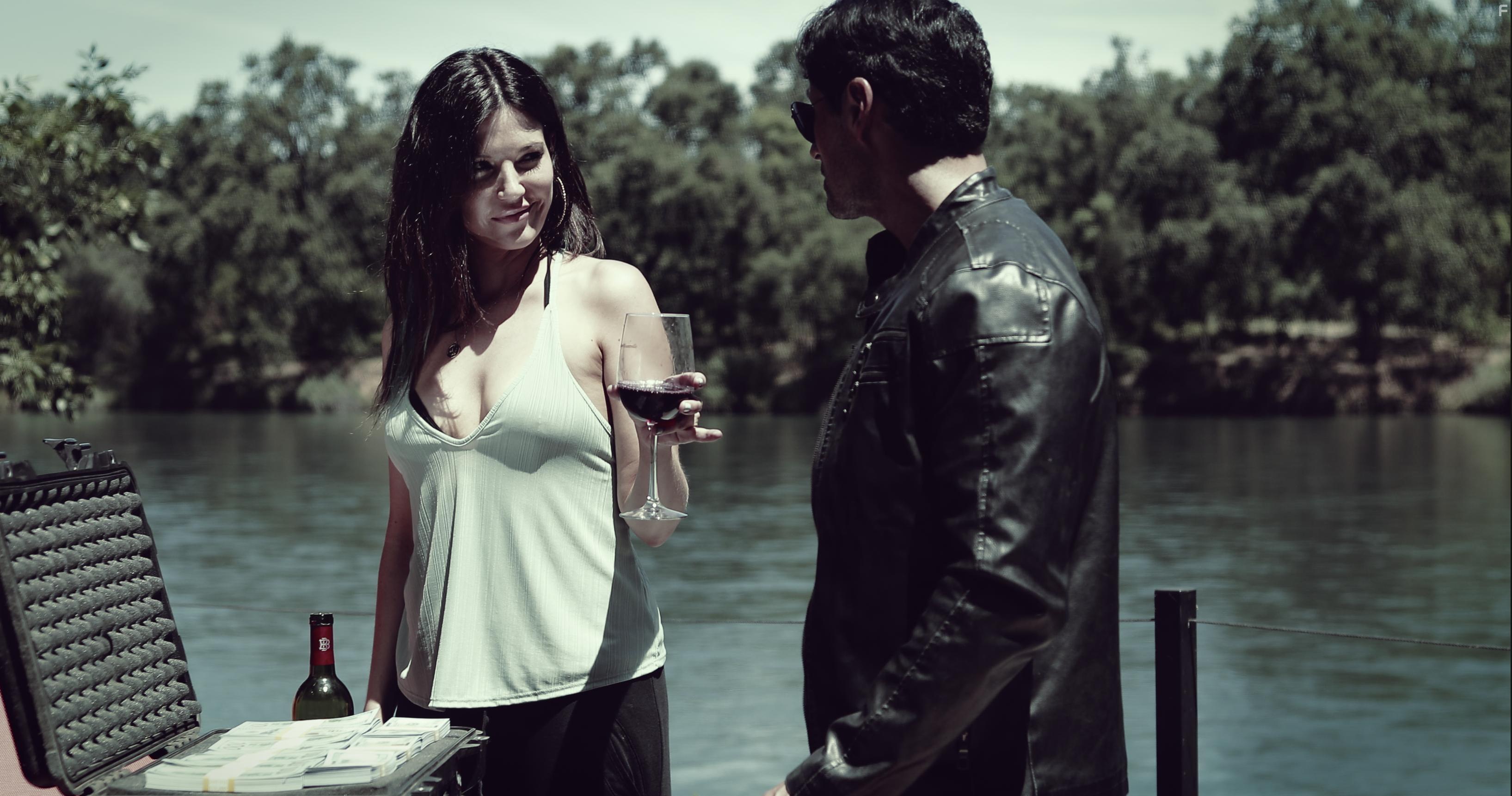 Eva Hamilton and John Ozuna in Cabal (2019)