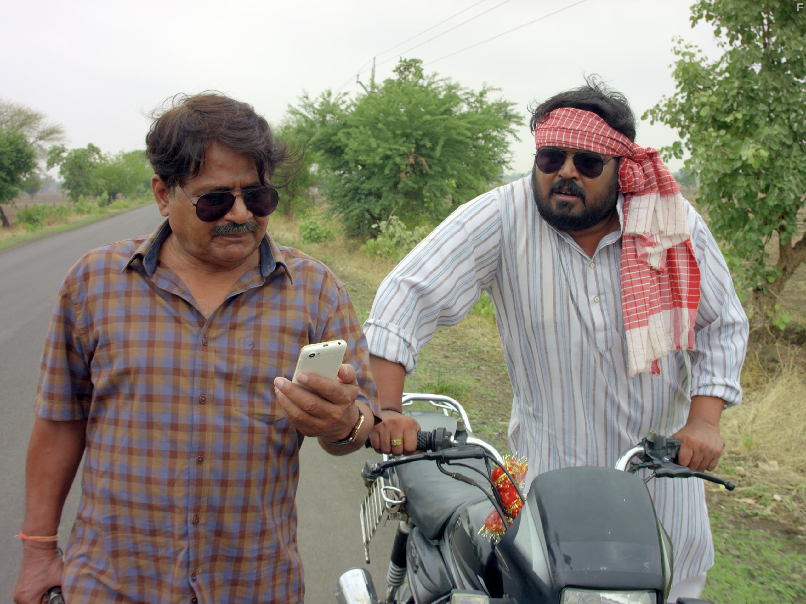 Raghuvir Yadav and Faisal Malik in Panchayat (2020)