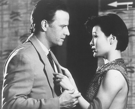Christopher Lambert and Joan Chen in Преследуемый (1995)