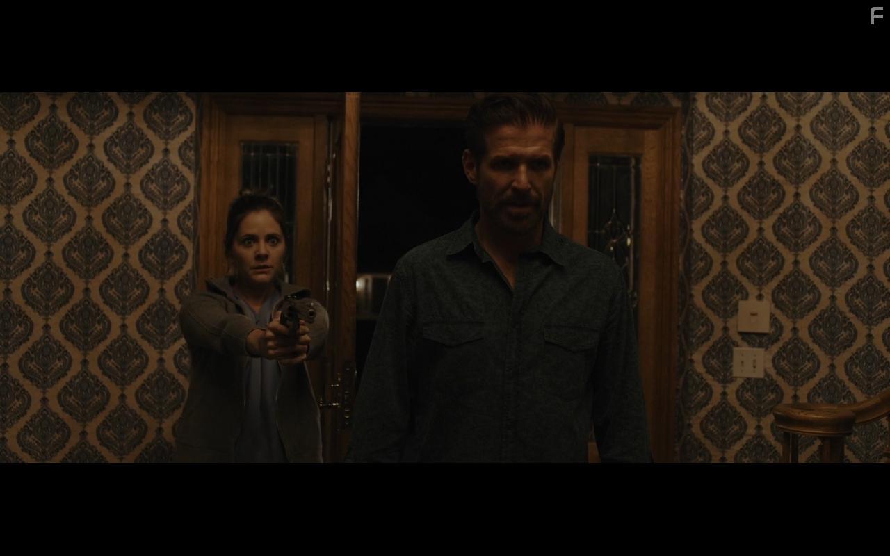 Aimee-Lynn Chadwick and Philip Brodie in Behind You (2020)