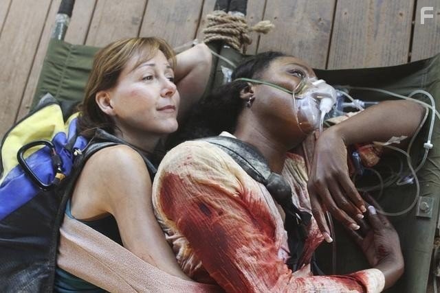 April Grace and Cynthia Stevenson in Без координат (2011)