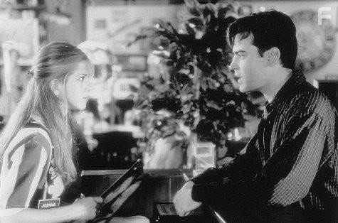 Jennifer Aniston and Ron Livingston in Офисное пространство (1999)