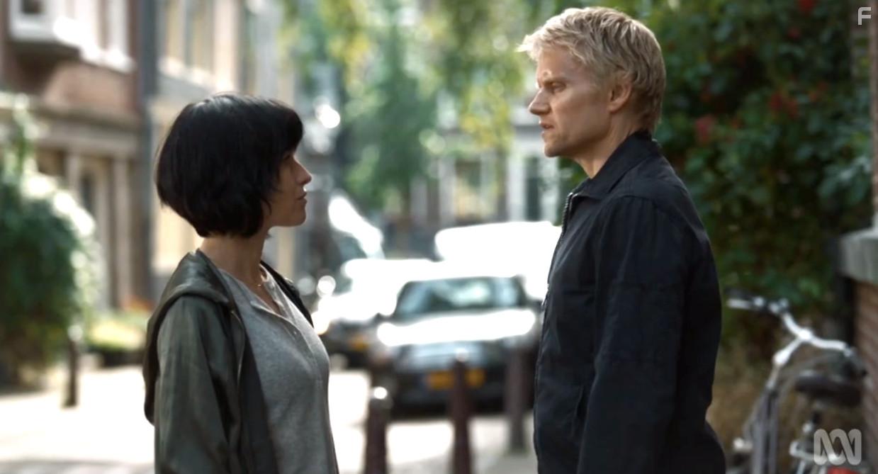 Marc Warren and Maimie McCoy in Van Der Valk (2020)