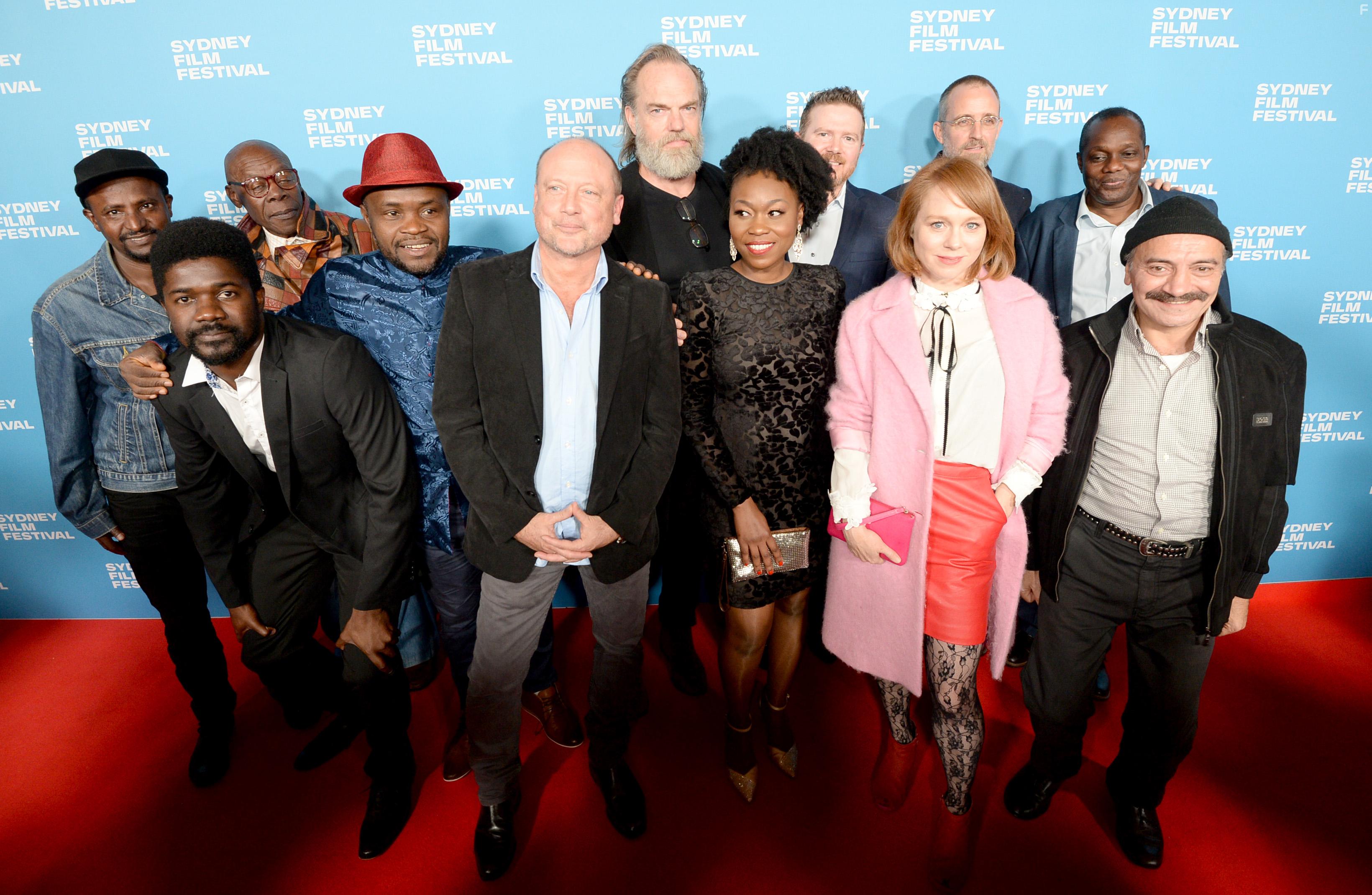 Alan Dukes, Hayley McElhinney, Matt Reeder, Andrew Luri, Sammila Sitole, Gassin Obeide Alameddine, Eric Ndabunguye, Dereb Desalegn, Mohamed Lamine Bangoura, Bolude Watson, Ben Lawrence, and Tendai Dzwairo at an event for Hearts and Bones (2019)