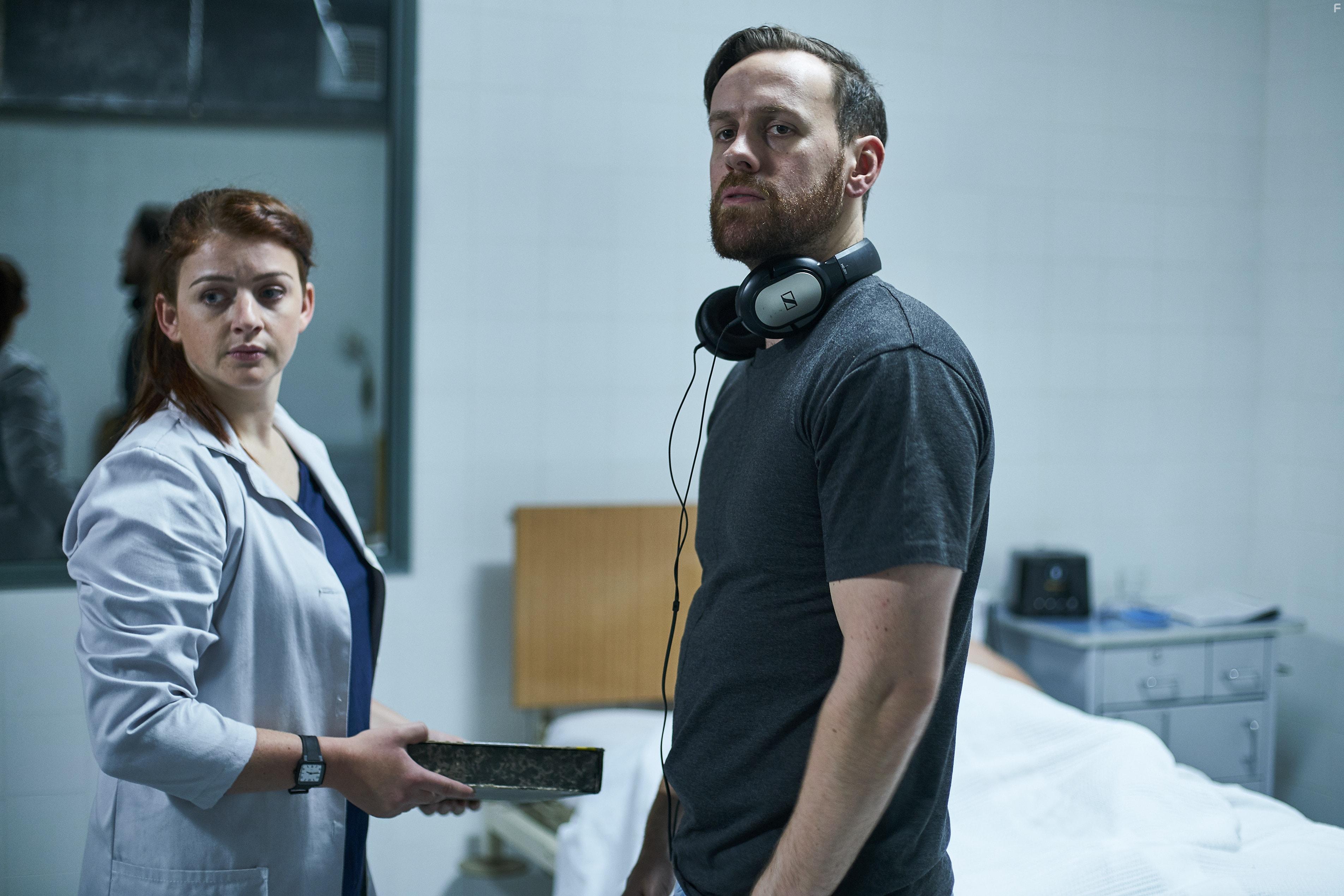 Sara West and Daniel J. Phillips in Awoken (2019)