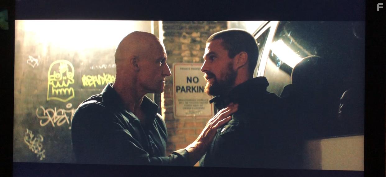 Kari Matchett, Simon Northwood, and Stephen Amell in Code 8 (2019)