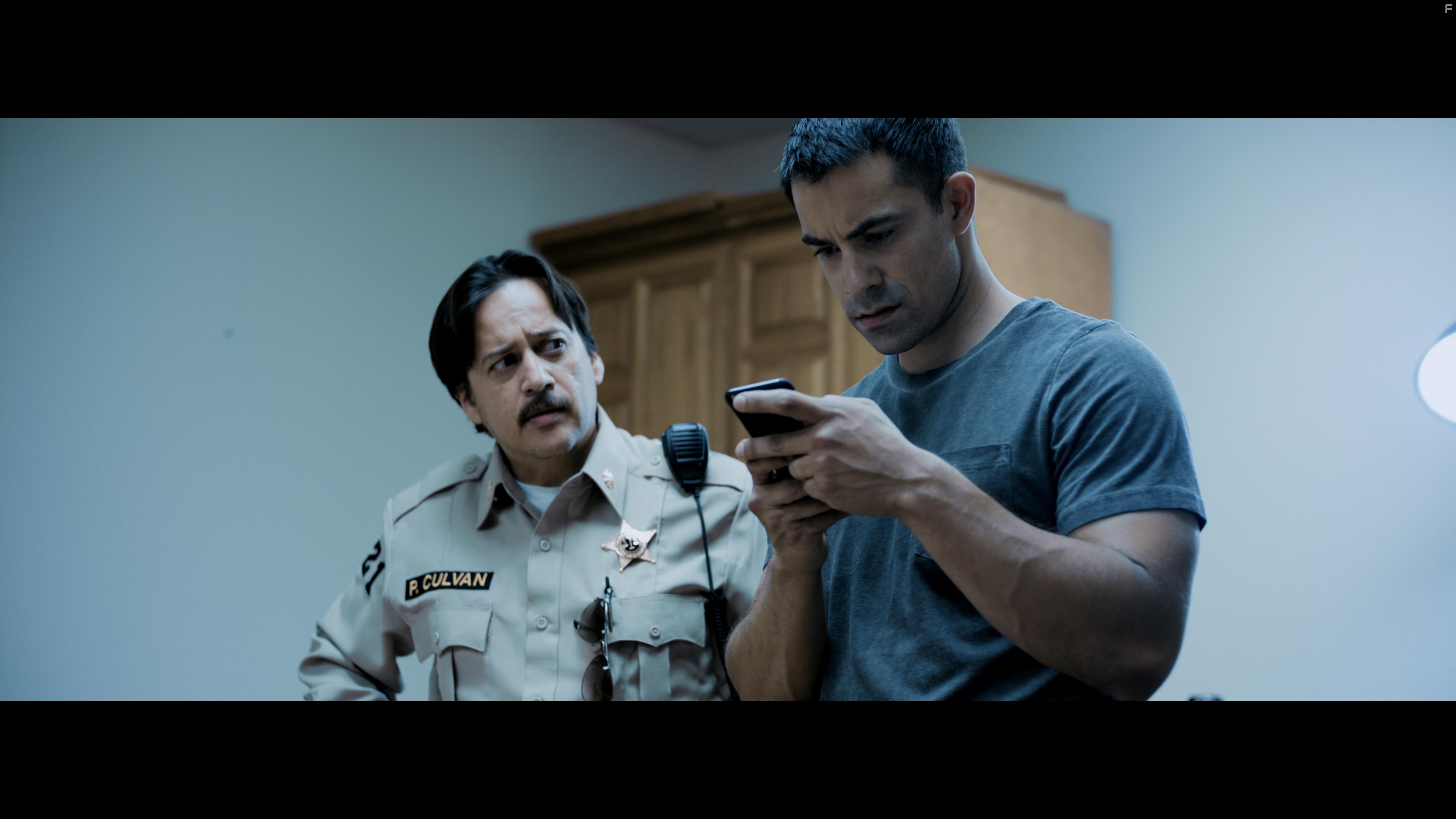 Manny M. Hernandez and Ace Marrero in Interpreters (2019)