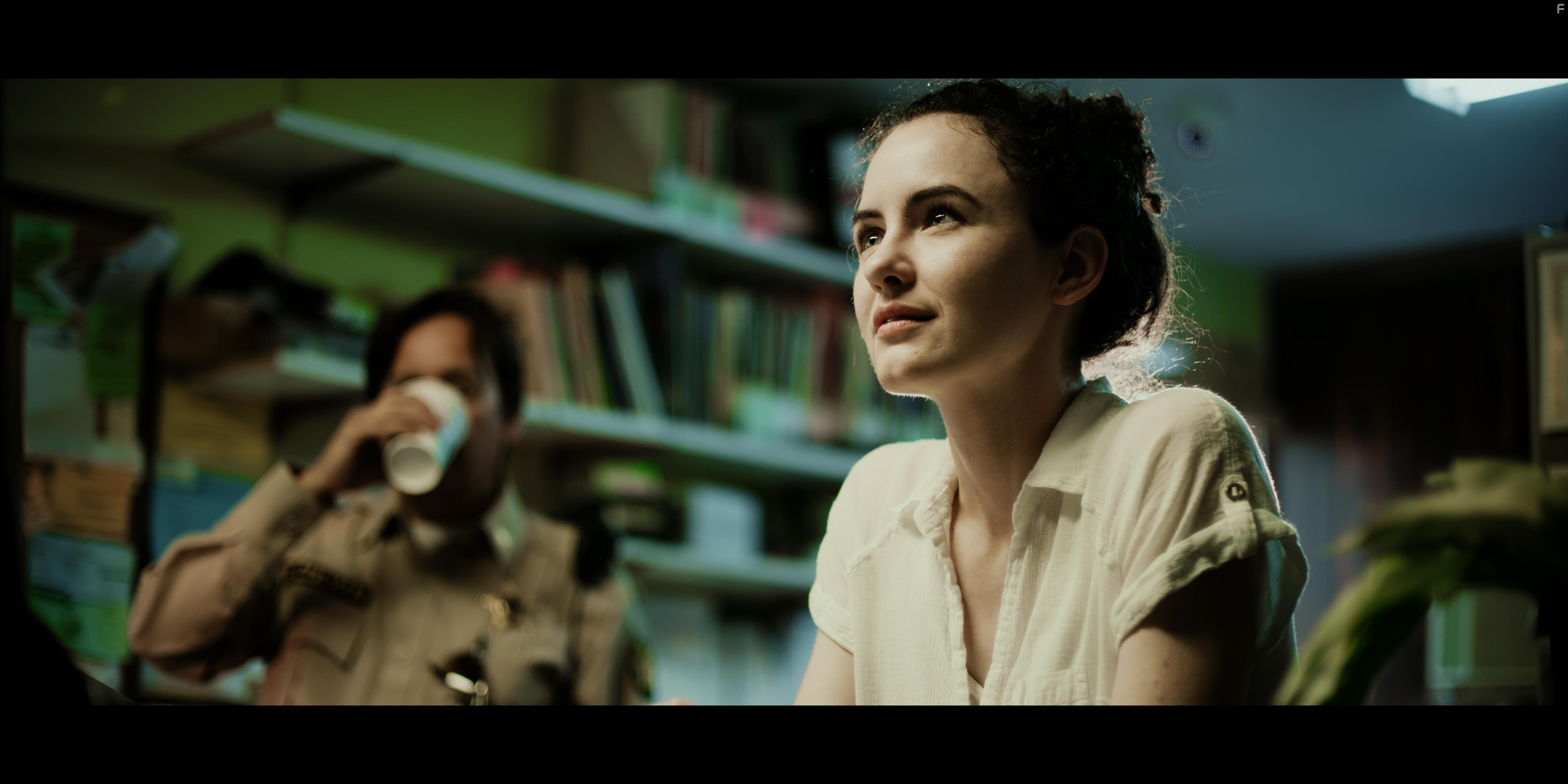 Manny M. Hernandez and Sophia Medley in Interpreters (2019)