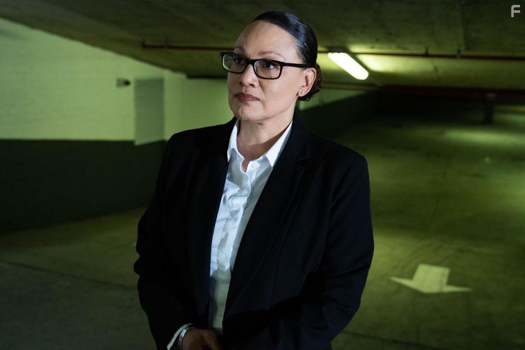 Sandi Schultz in Trackers: Episode #1.1 (2019)