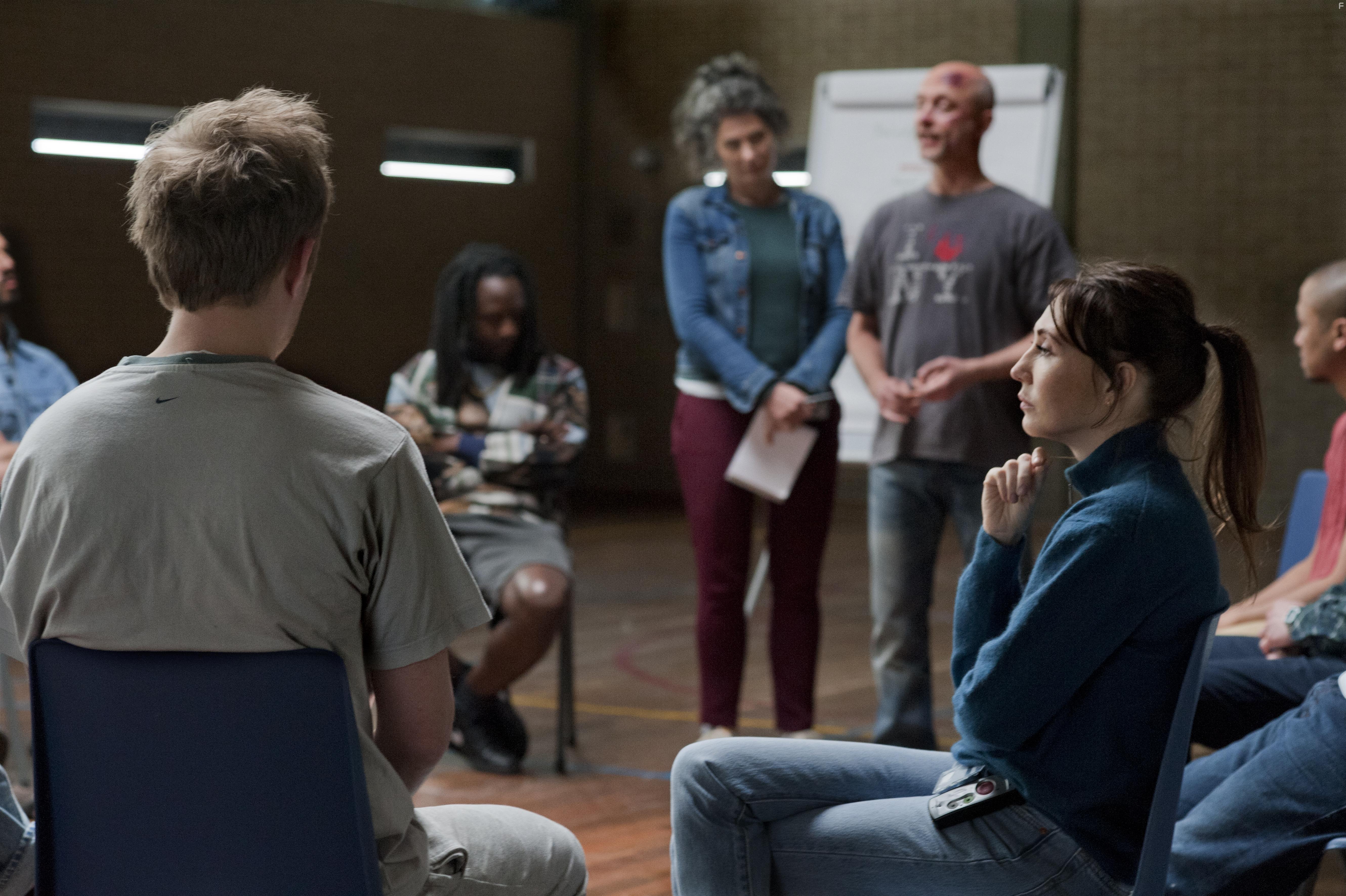 Tamar van den Dop, Carice van Houten, and Marwan Kenzari in Instinct (2019)
