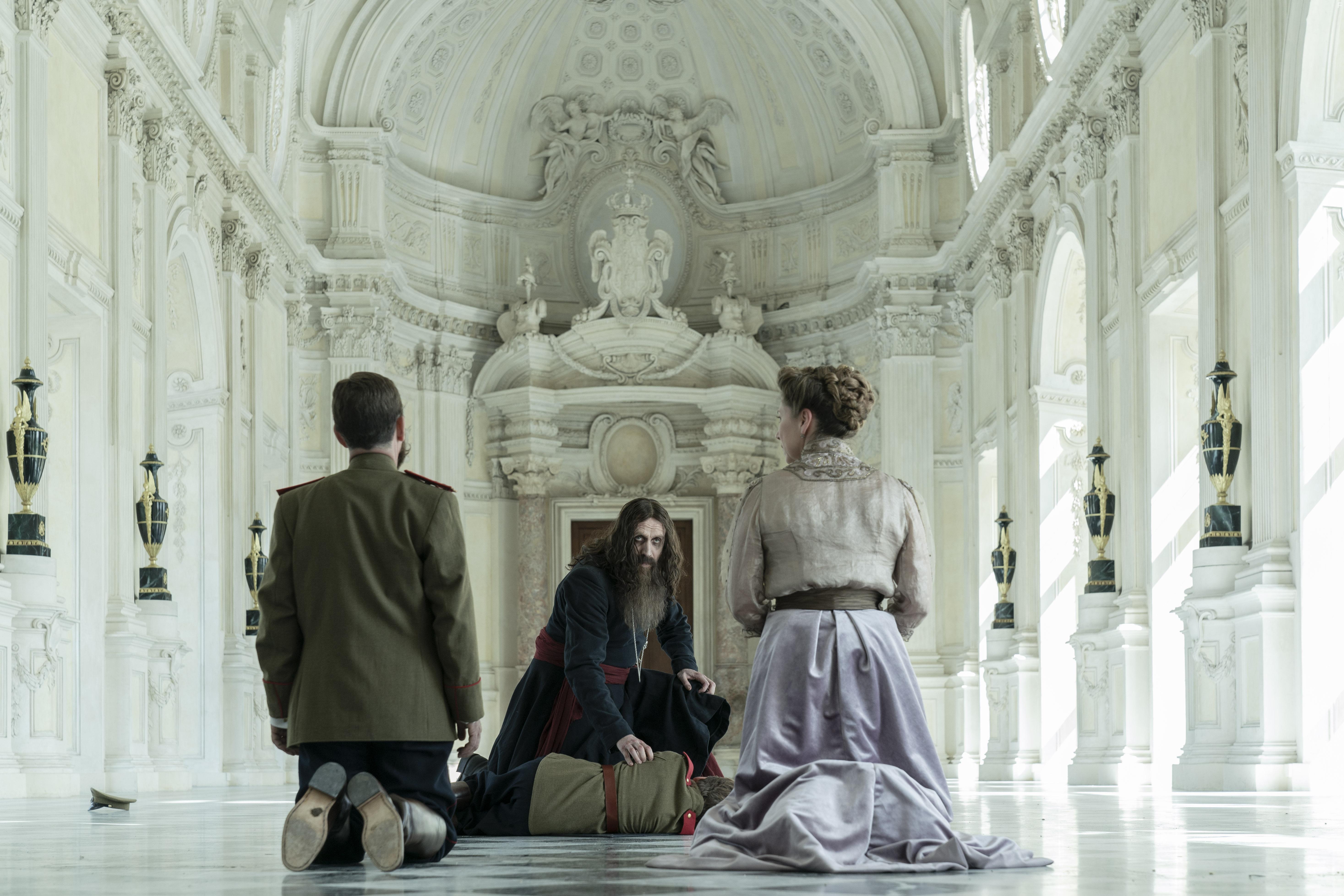 Rhys Ifans, Branka Katic, and Peter Mountain in The King's Man (2021)