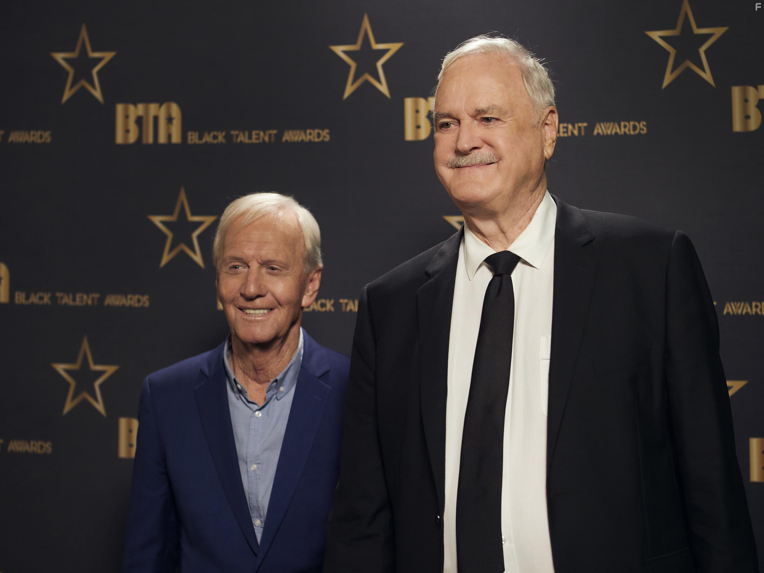 John Cleese and Paul Hogan in The Very Excellent Mr. Dundee (2020)