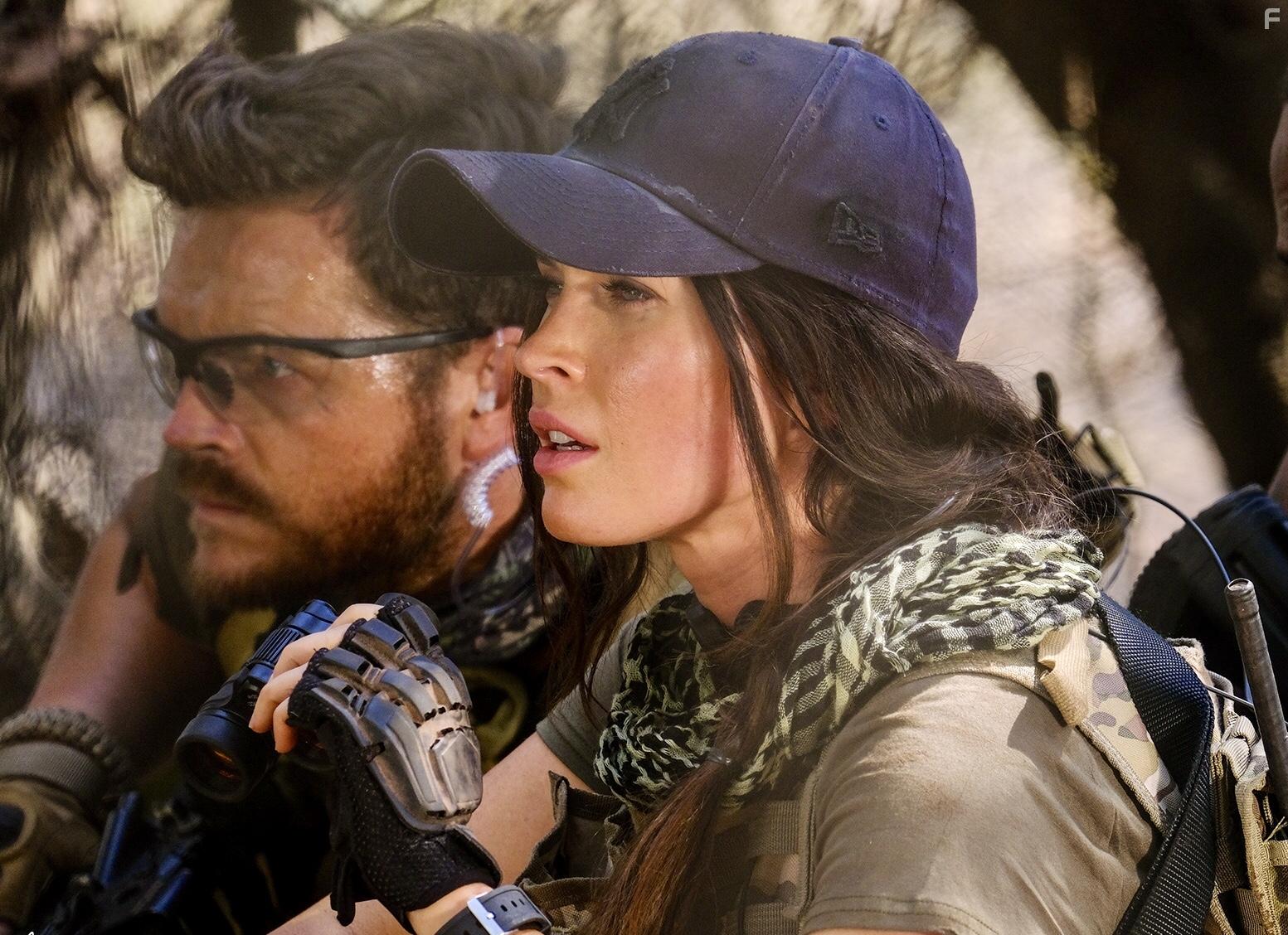 Megan Fox and Greg Kriek in Rogue (2020)