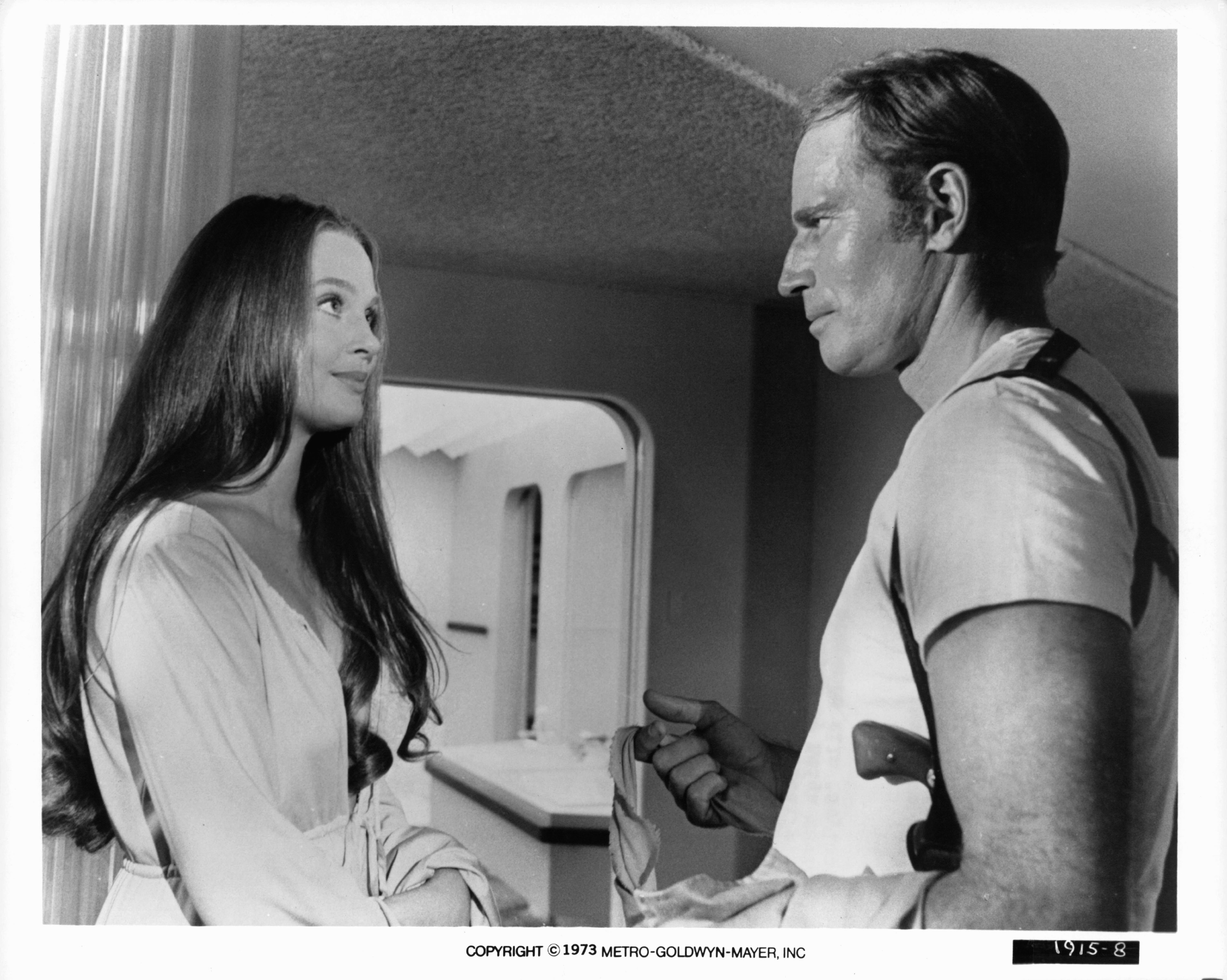 Charlton Heston and Leigh Taylor-Young in Зеленый сойлент (1973)