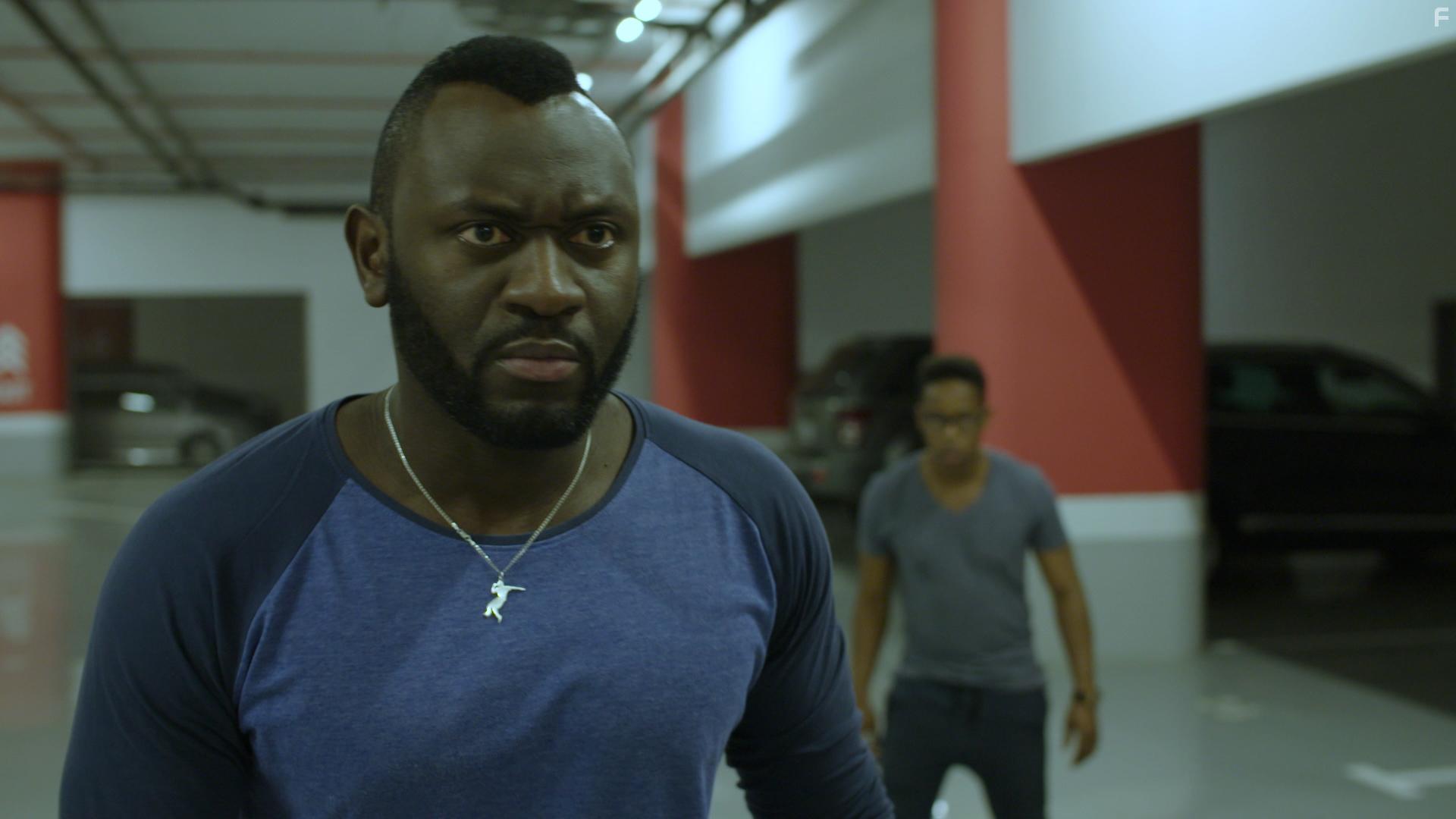 Pacou Mutombo and Katlego Baaitse in Jongo (2016)