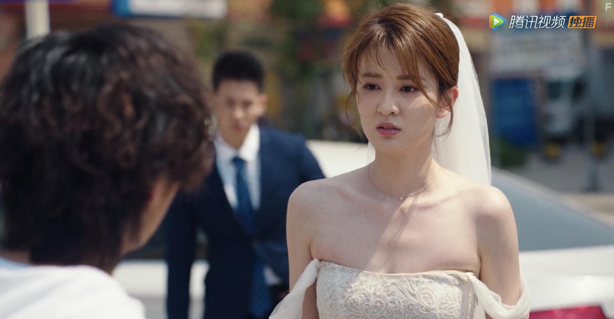 Han Lu and Xin Qiao in Cross Fire (2020)