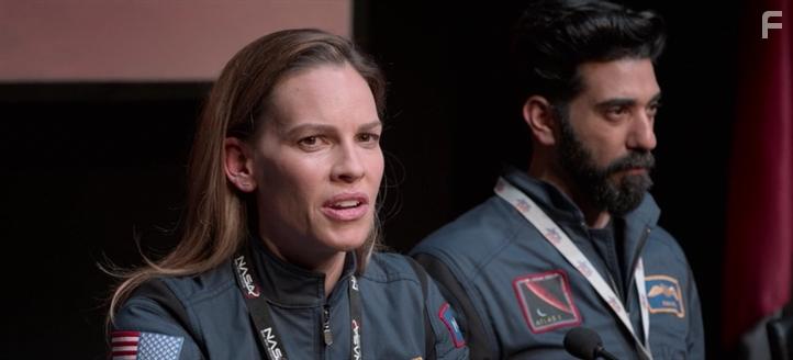 Hilary Swank and Ray Panthaki in Away (2020)