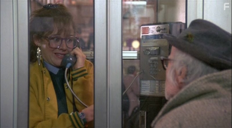 Penelope Ann Miller and John Dee in Приключения няни (1987)