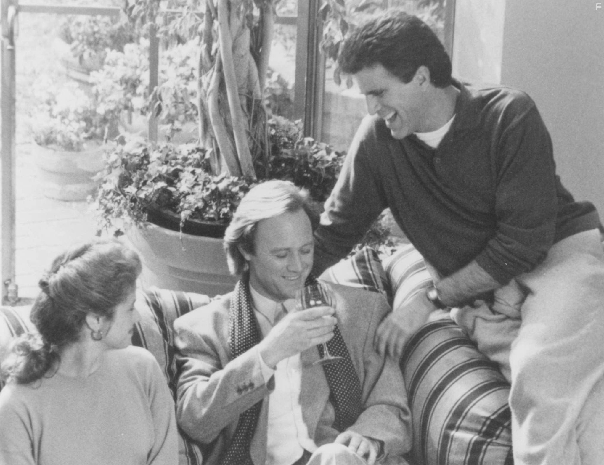 Ted Danson and Nancy Travis in Трое мужчин и маленькая леди (1990)