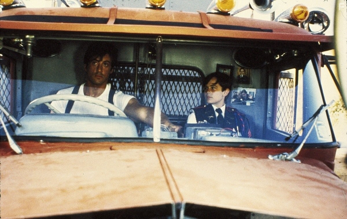 Sylvester Stallone and David Mendenhall in Изо всех сил (1987)