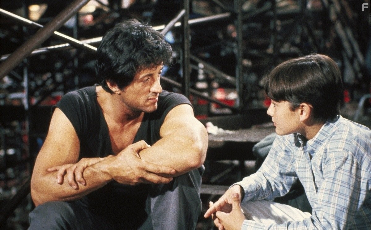 Sylvester Stallone and David Mendenhall in Изо всех сил (1987)