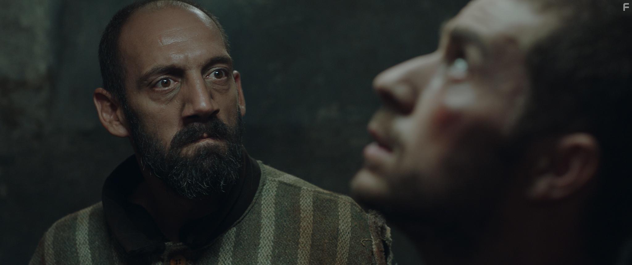 Csaba Ciugulitu and Vali Popescu in Between Pain and Amen (2019)