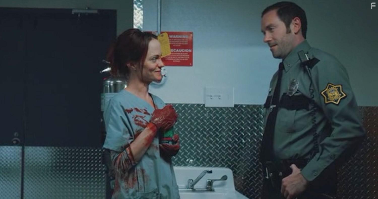 Angela Bettis and Kit Williamson in 12 Hour Shift (2020)