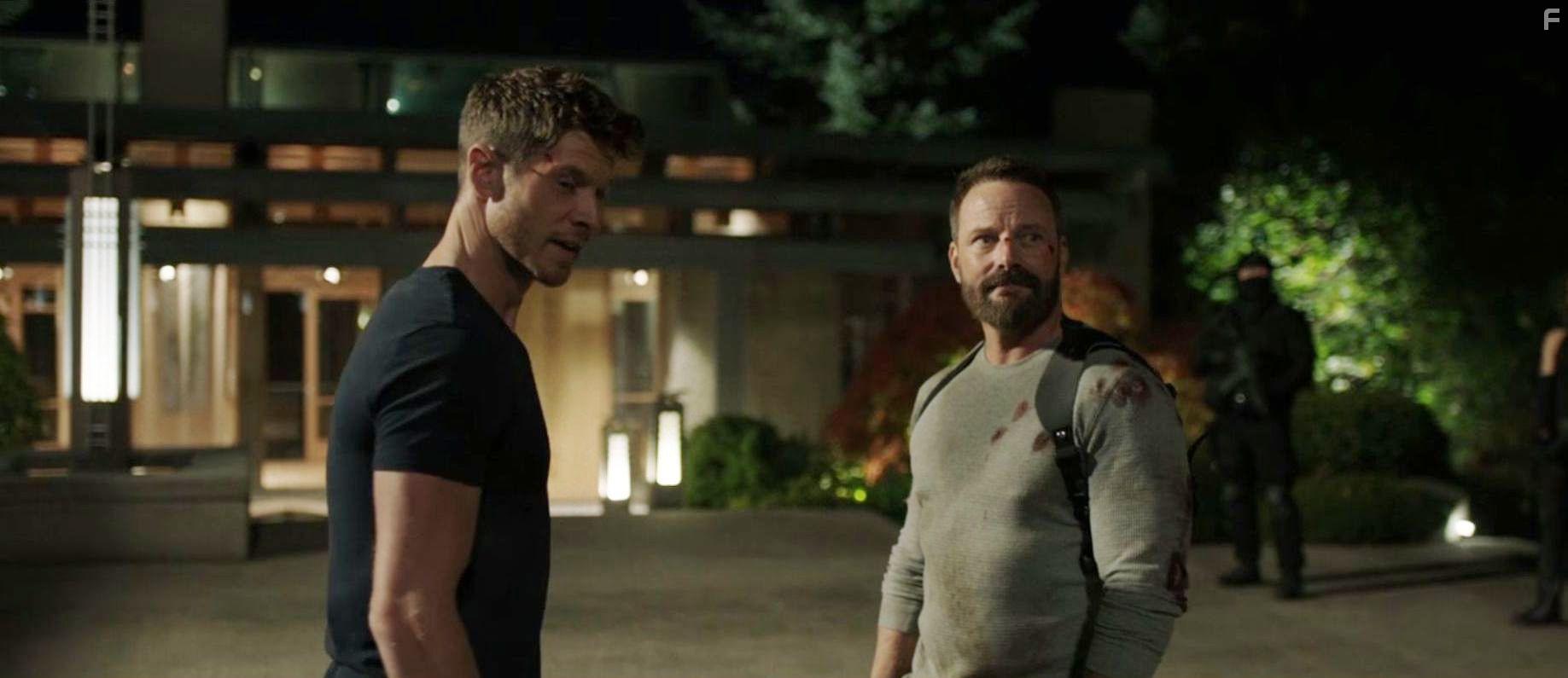 Ryan Robbins and Chad Michael Collins in Sniper: Assassin's End (2020)