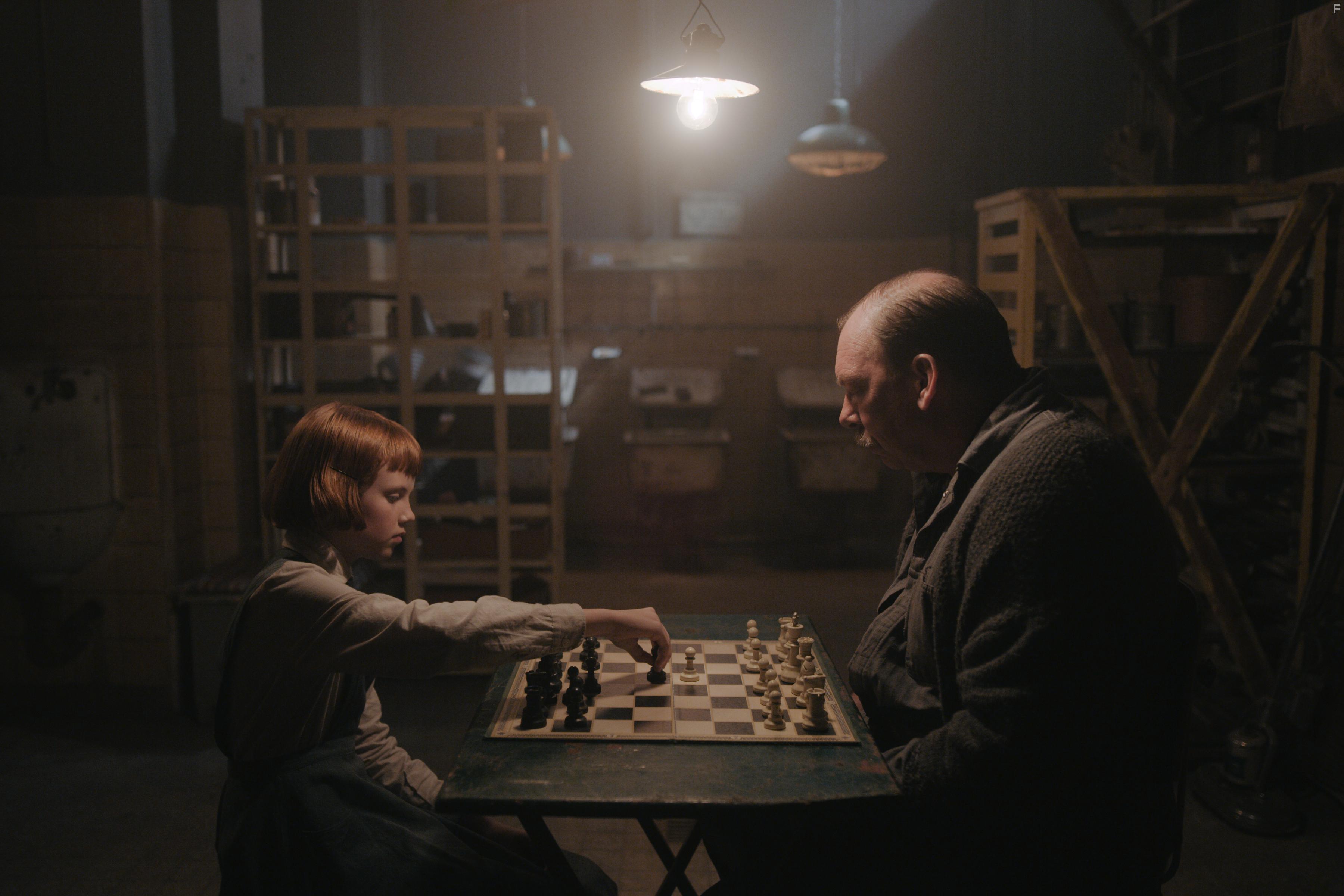 Bill Camp and Isla Johnston in The Queen's Gambit (2020)