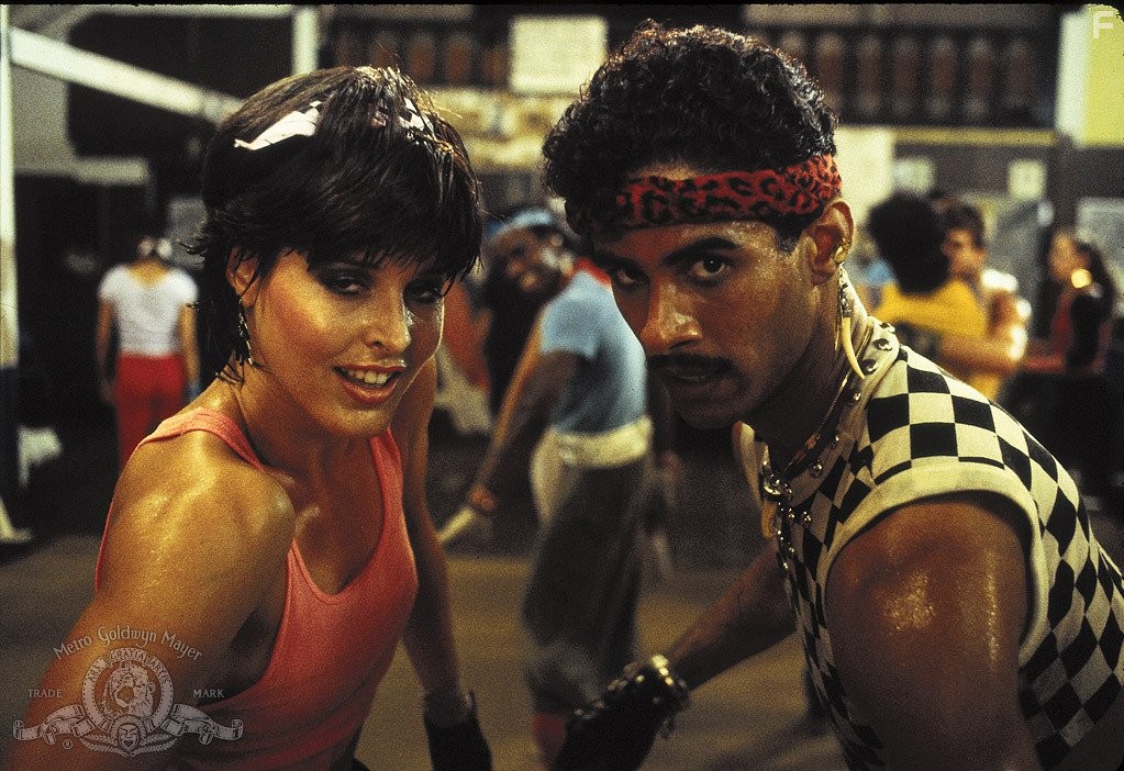 Lucinda Dickey and Adolfo Quinones in Брейк-данс 2: Электрическое Бугало (1984)
