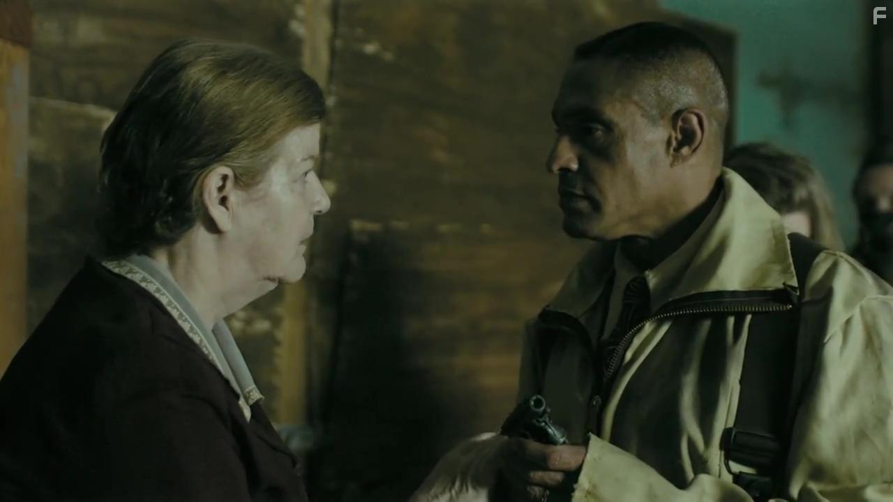 Casey Kramer and David Labiosa in Darkness in Tenement 45 (2020)